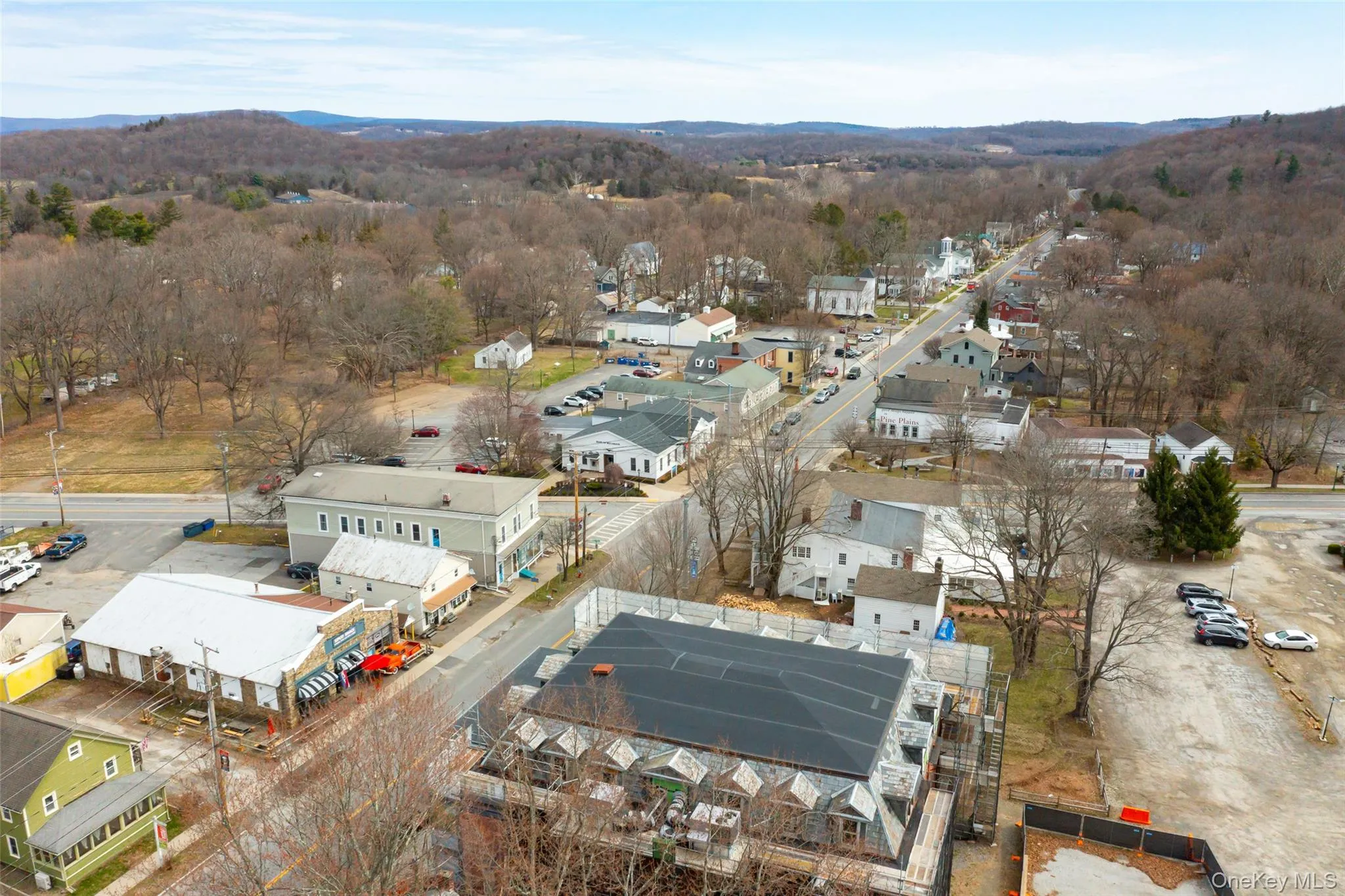 Aerial view with a mountain view looking east from main intersection. Aerial view with a mountain view looking east from main intersection.