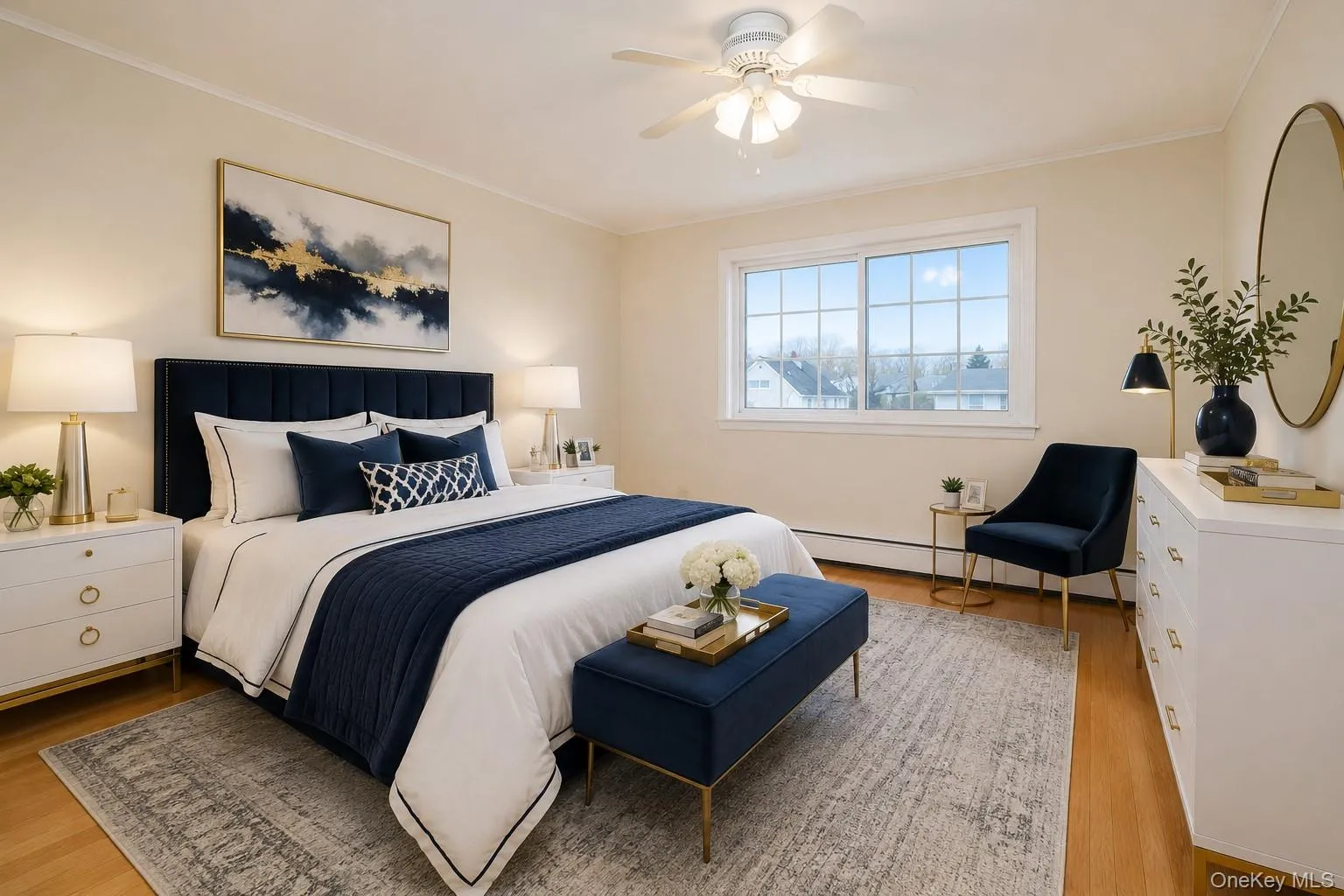Spacious and sun-filled bedroom featuring hardwood floors, a large window, and a comfortable layout. The bright, airy feel and generous space make it an ideal retreat for rest and relaxation. Spacious and sun-filled bedroom featuring hardwood floors, a large window, and a comfortable layout. The bright, airy feel and generous space make it an ideal retreat for rest and relaxation.