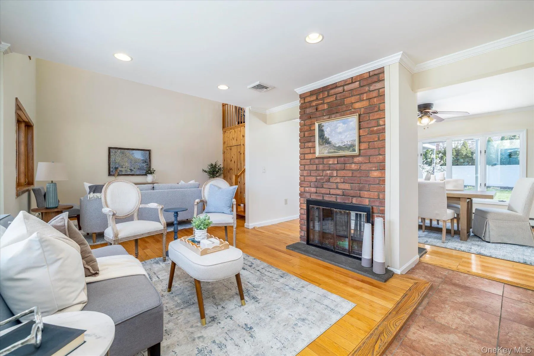 Living room with double-sided wood-burning fireplace Living room with double-sided wood-burning fireplace