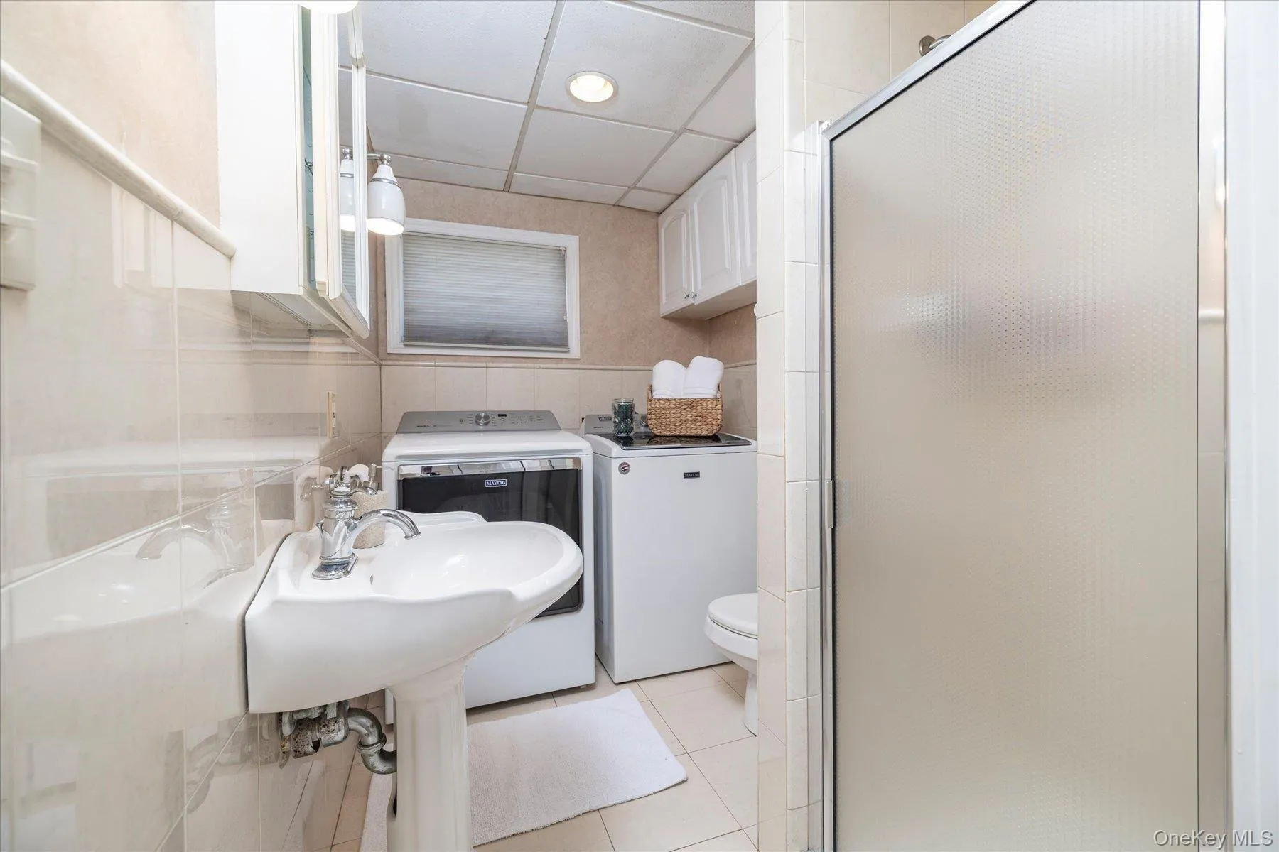 Main Floor Bath + washer and dryer Main Floor Bath + washer and dryer