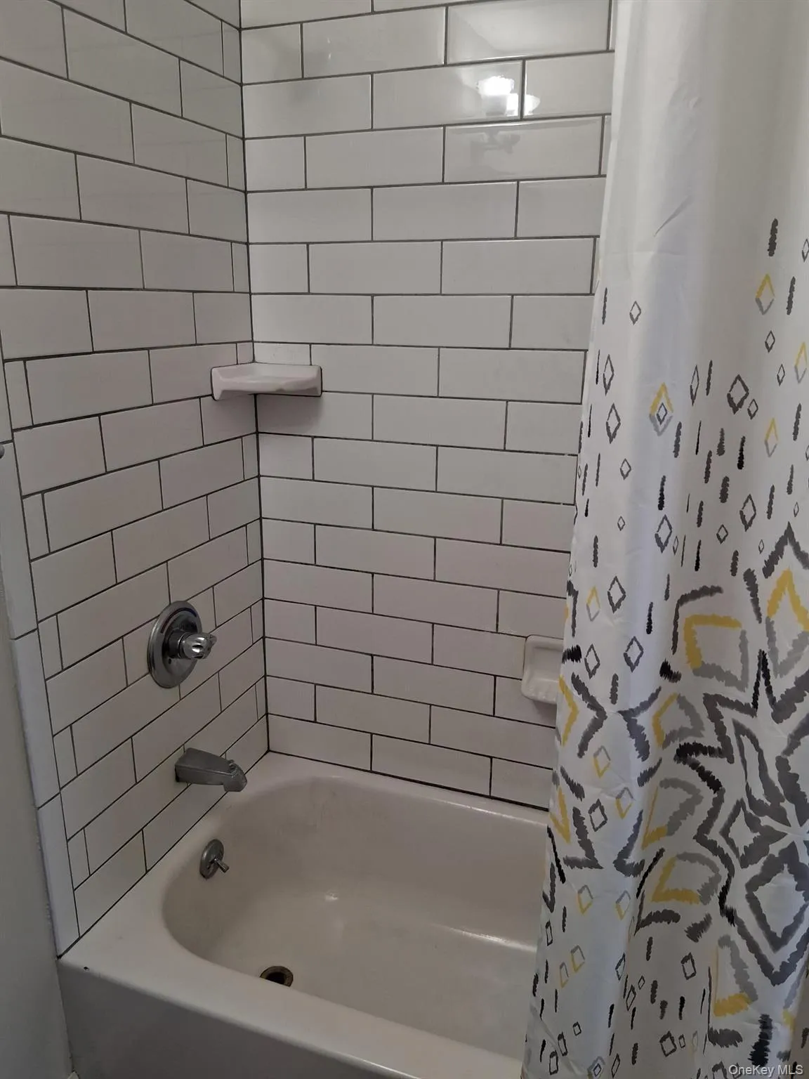 Bathroom with shower / tub combo Bathroom with shower / tub combo