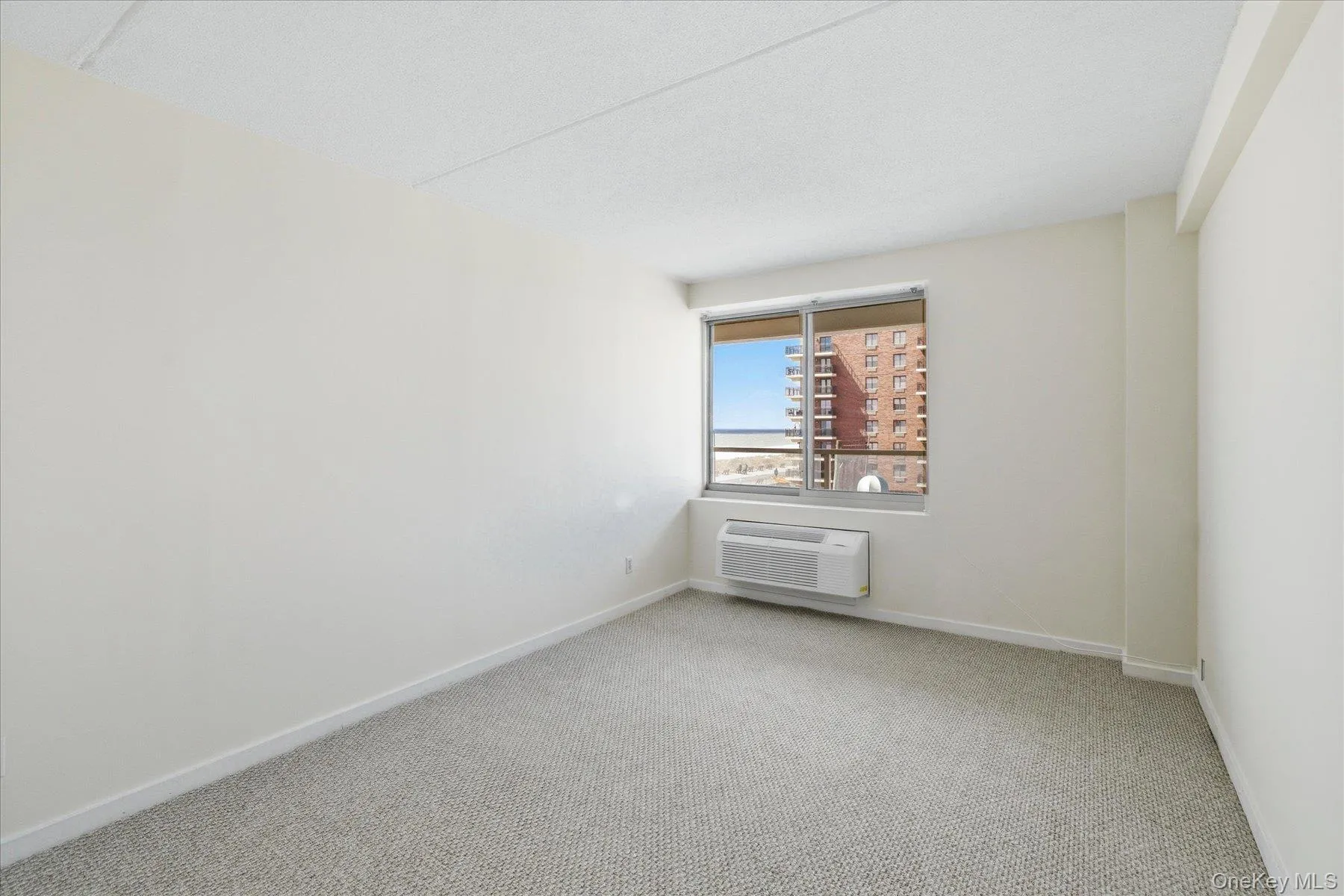 Second bedroom with brand new carpet and ocean views Second bedroom with brand new carpet and ocean views