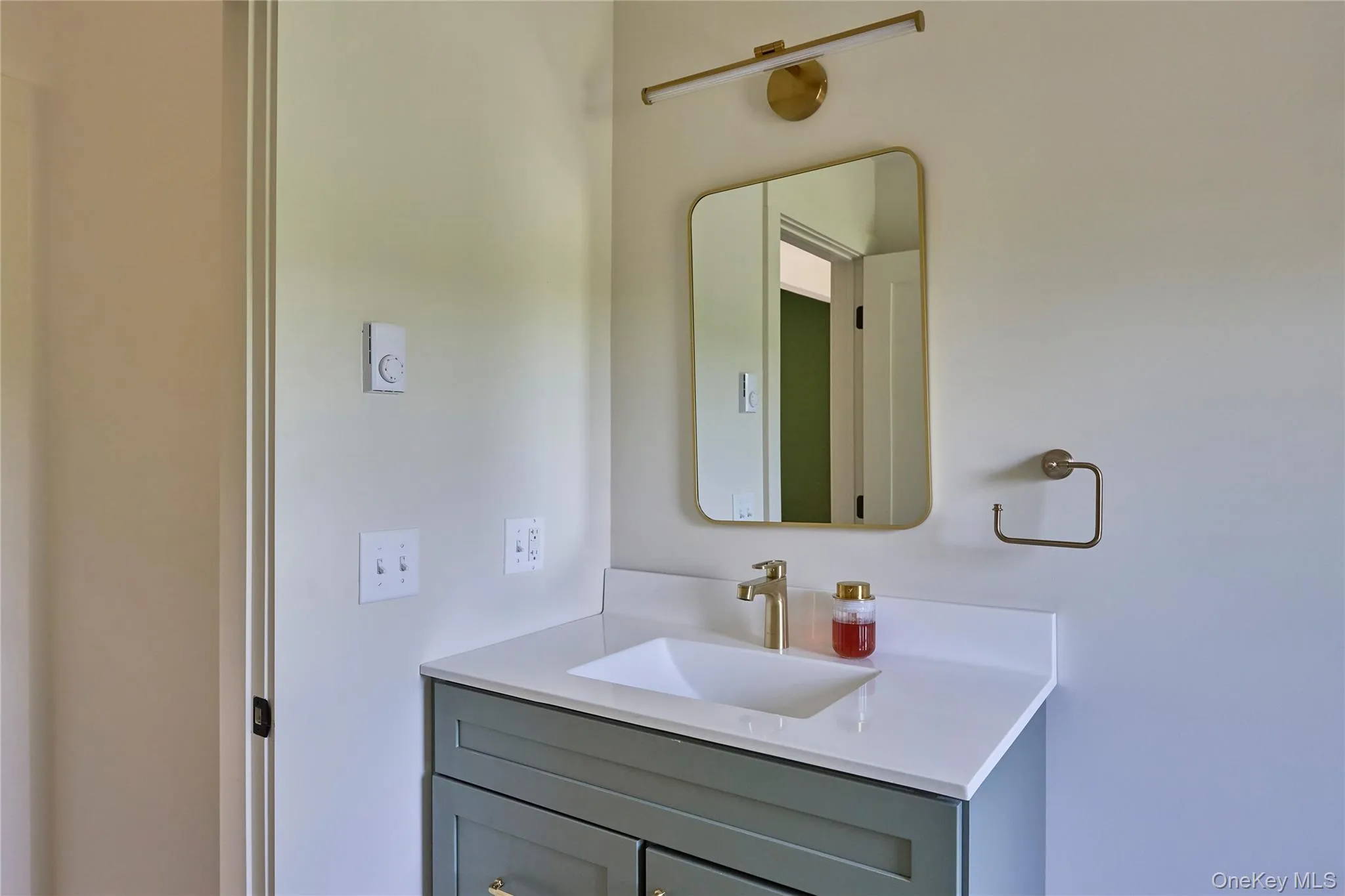 Bathroom featuring vanity Bathroom featuring vanity