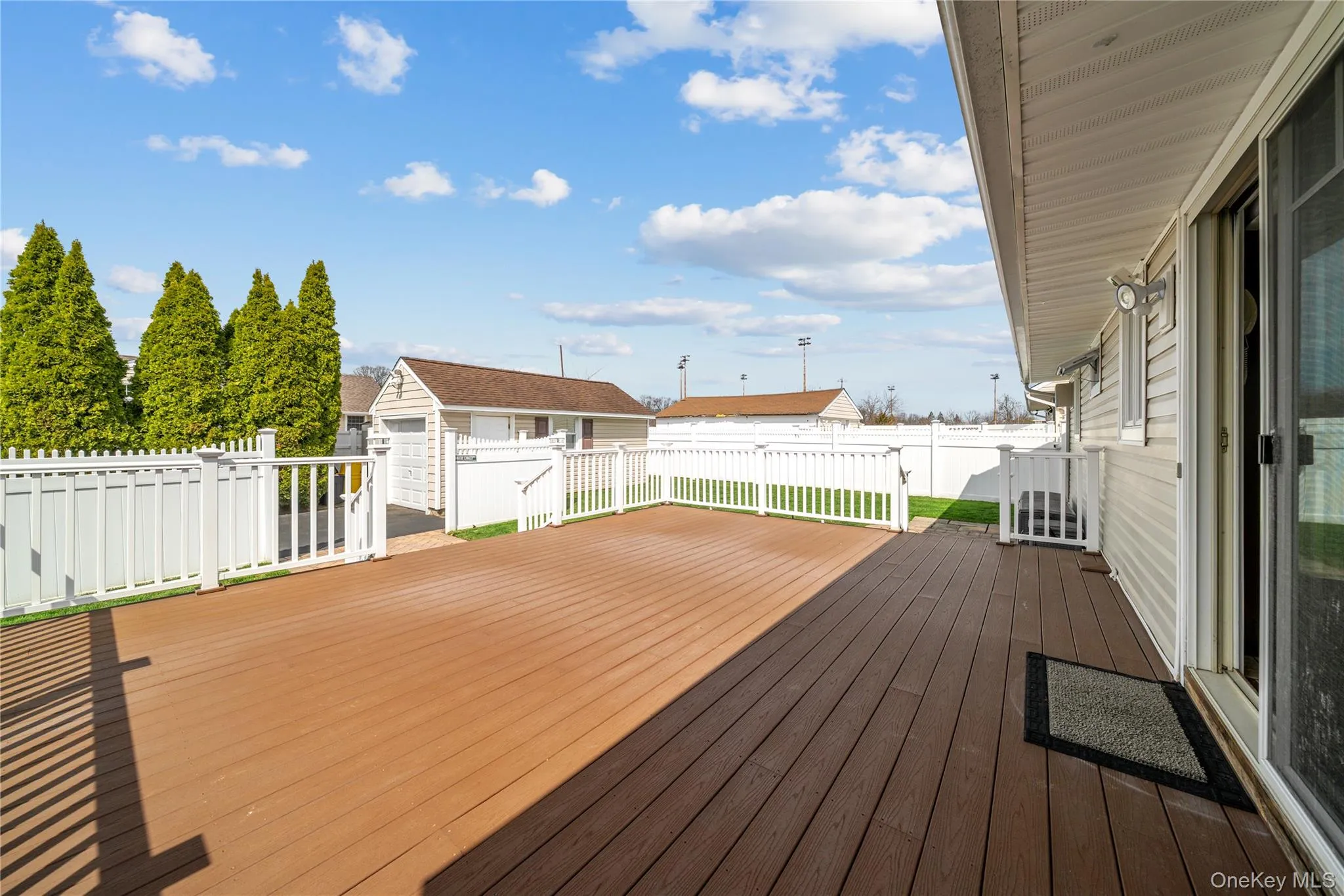 Wooden deck featuring a residential view Wooden deck featuring a residential view