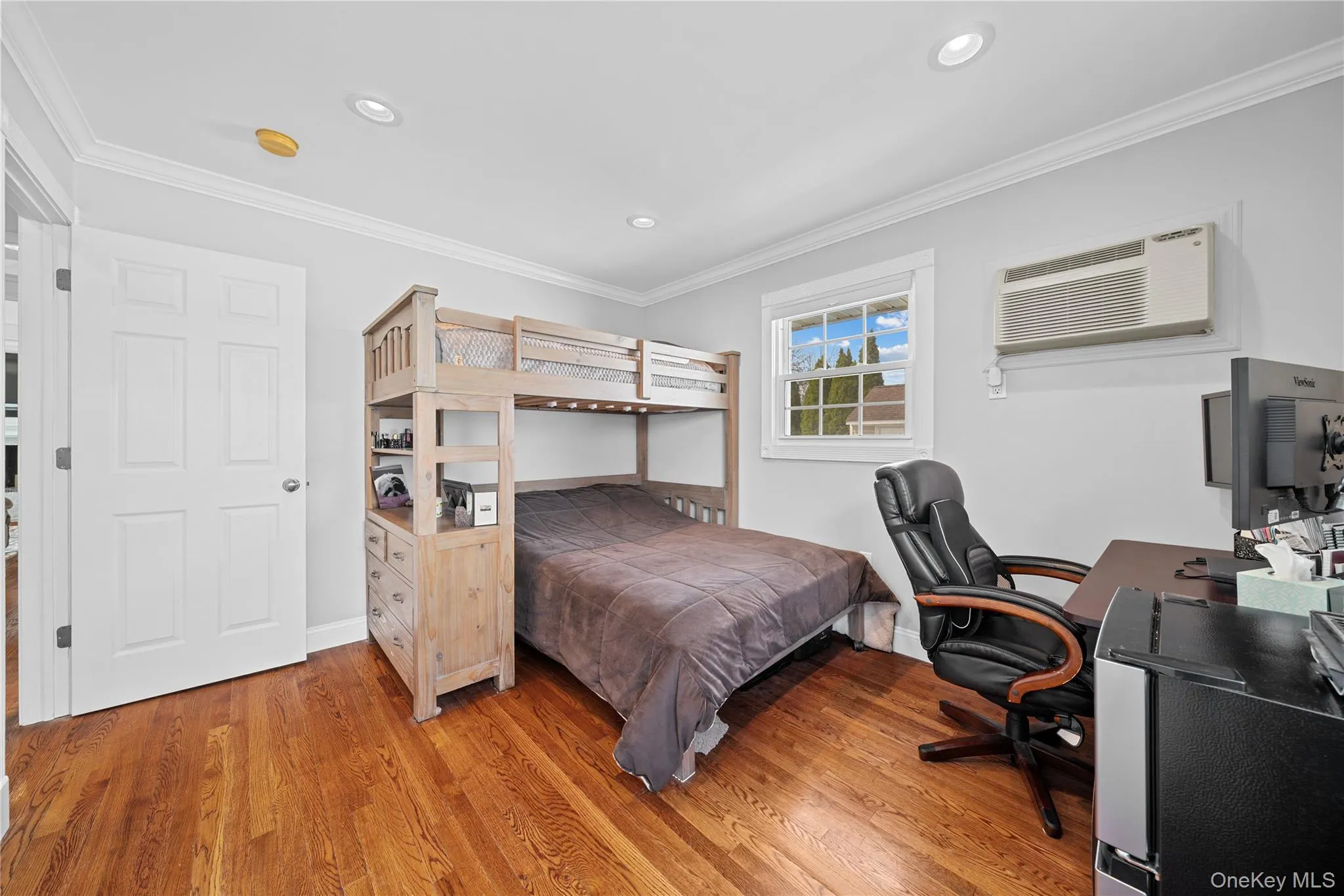 Bedroom featuring crown molding, light wood-style flooring, a desk, and recessed lighting Bedroom featuring crown molding, light wood-style flooring, a desk, and recessed lighting