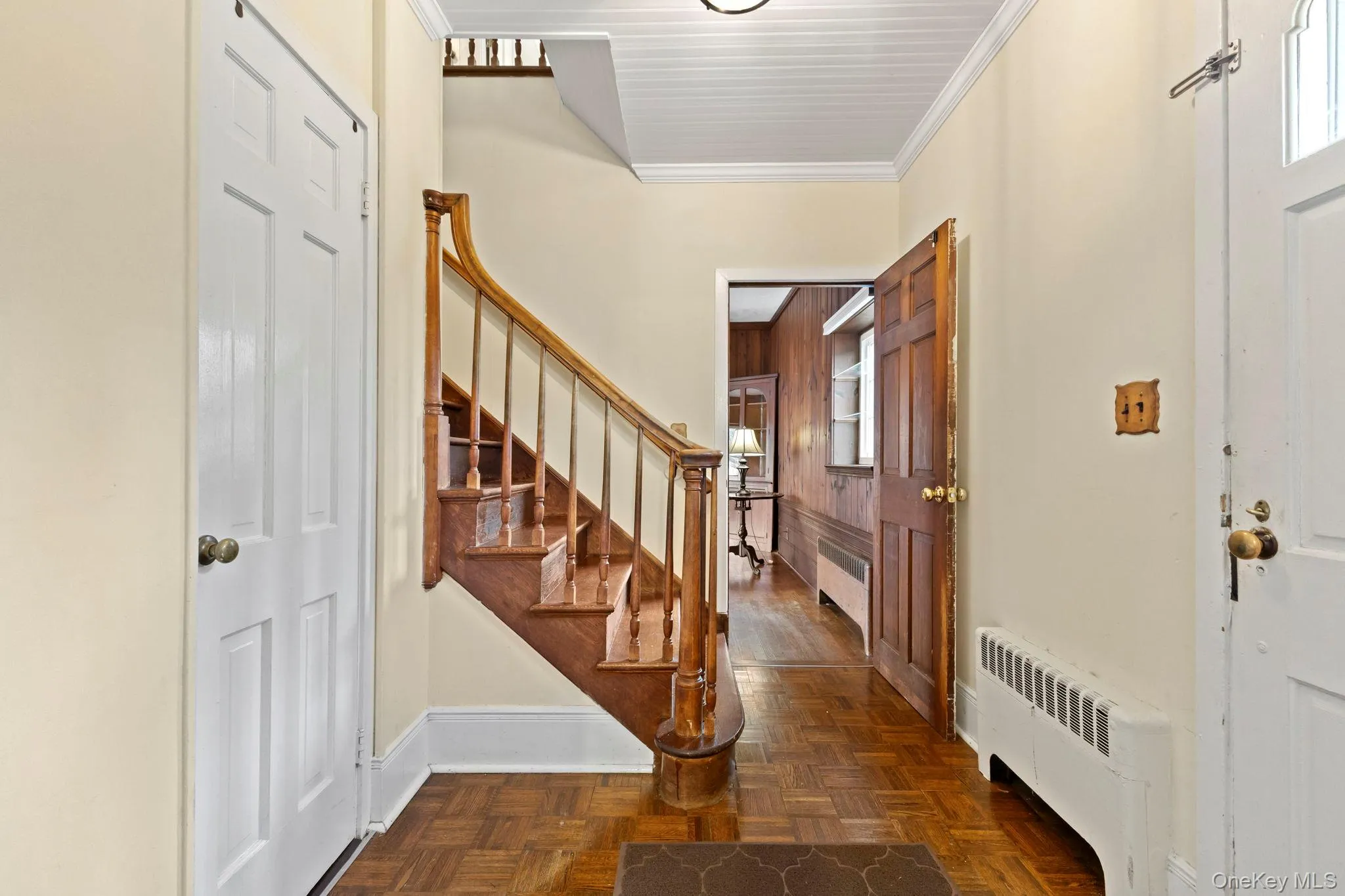 Leading back to Entry Foyer from Kitchen Leading back to Entry Foyer from Kitchen
