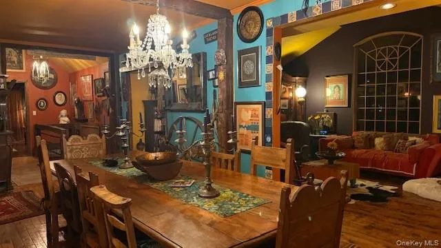 dining area with wood flooring dining area with wood flooring