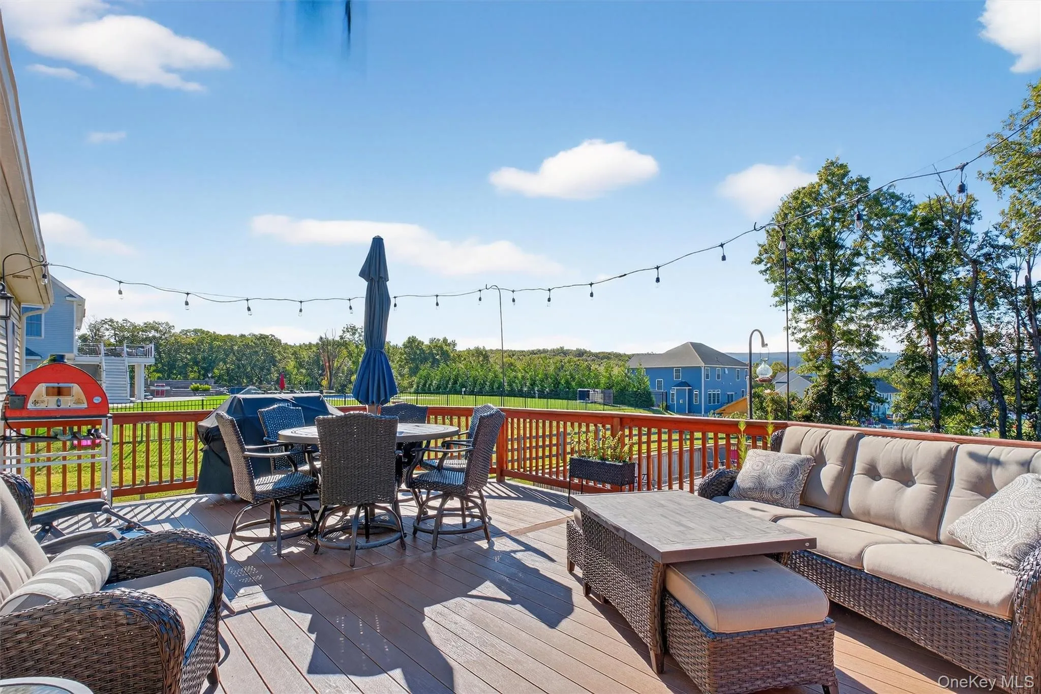Wooden terrace featuring outdoor lounge area Wooden terrace featuring outdoor lounge area