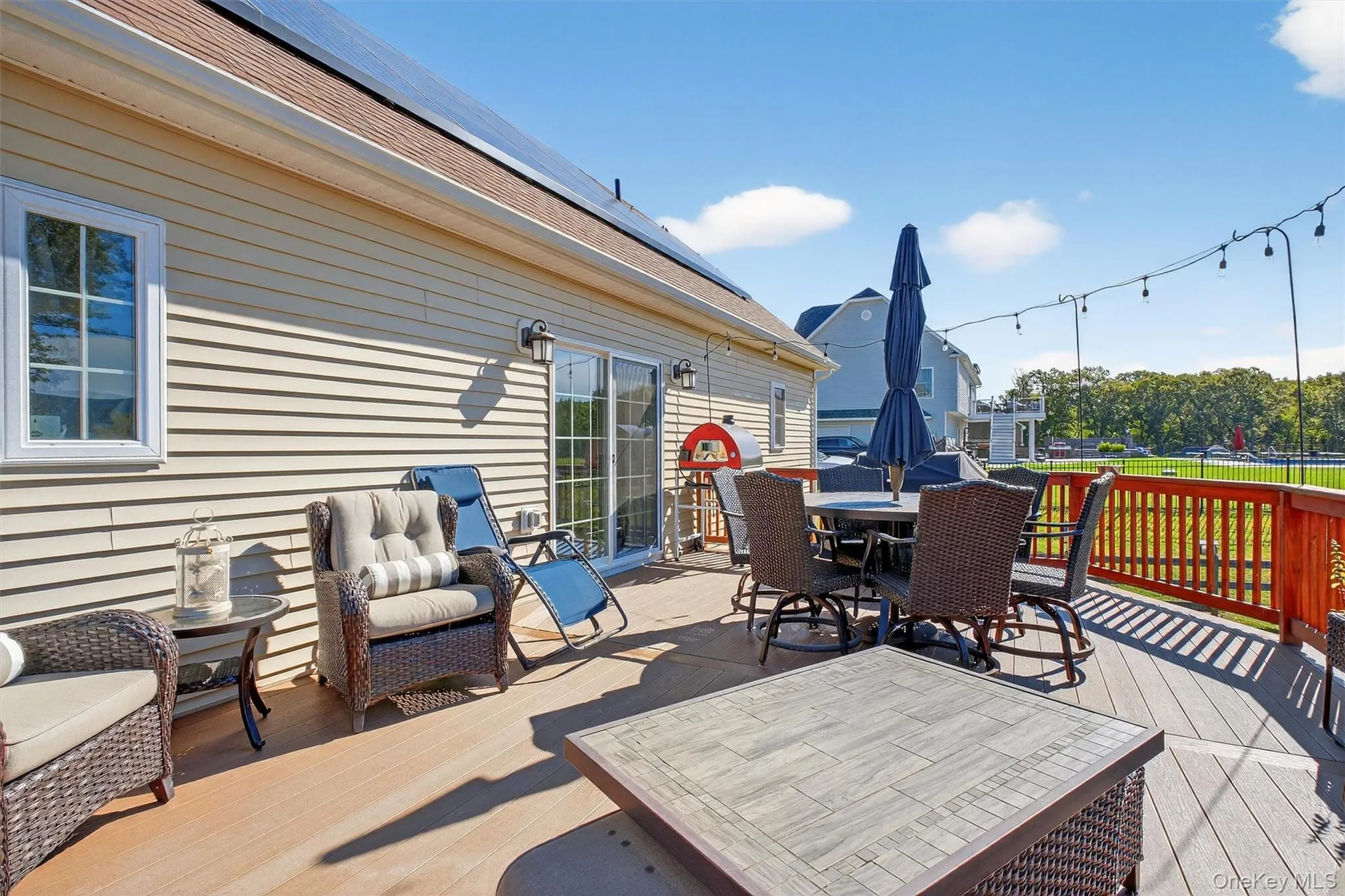 Wooden deck with outdoor dining space Wooden deck with outdoor dining space