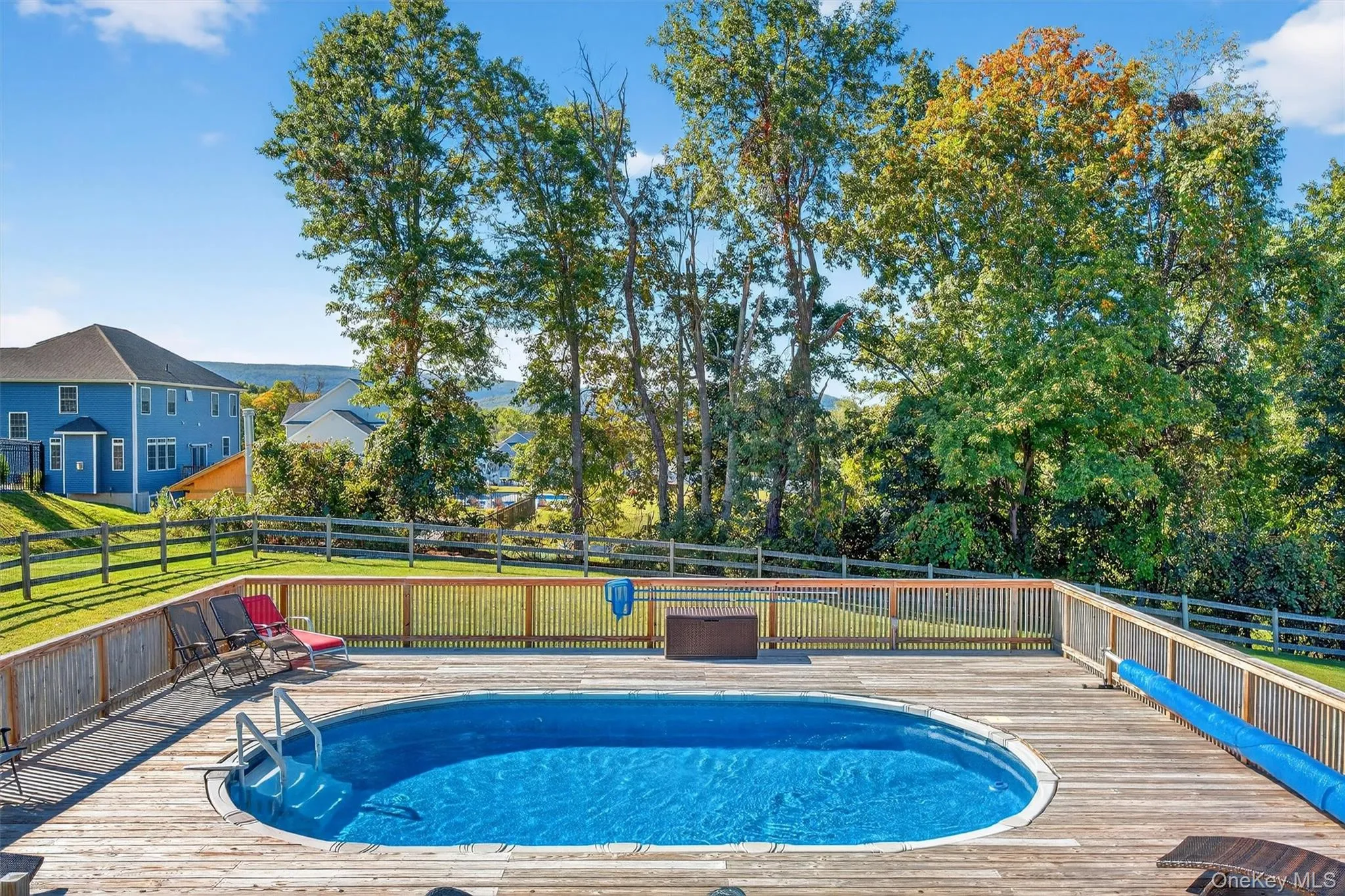 View of pool featuring a deck View of pool featuring a deck
