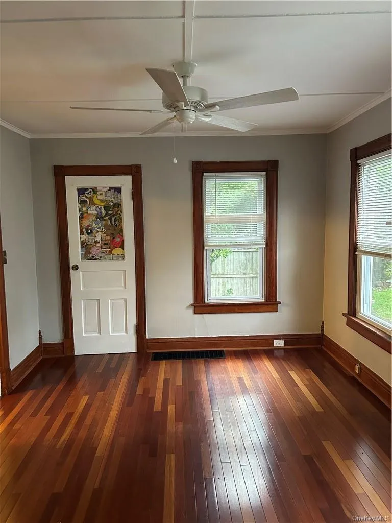 Dining Room with hardwood flooring, plenty of windows and natural lighting Dining Room with hardwood flooring, plenty of windows and natural lighting