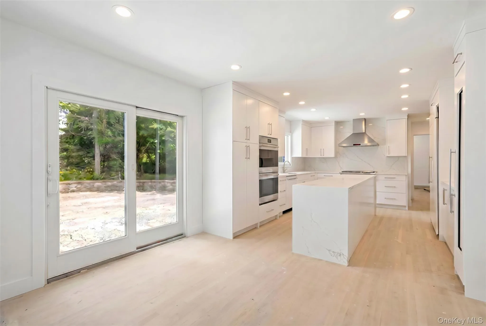 Alternate View of Kitchen with Sliding Doors to Patio Alternate View of Kitchen with Sliding Doors to Patio