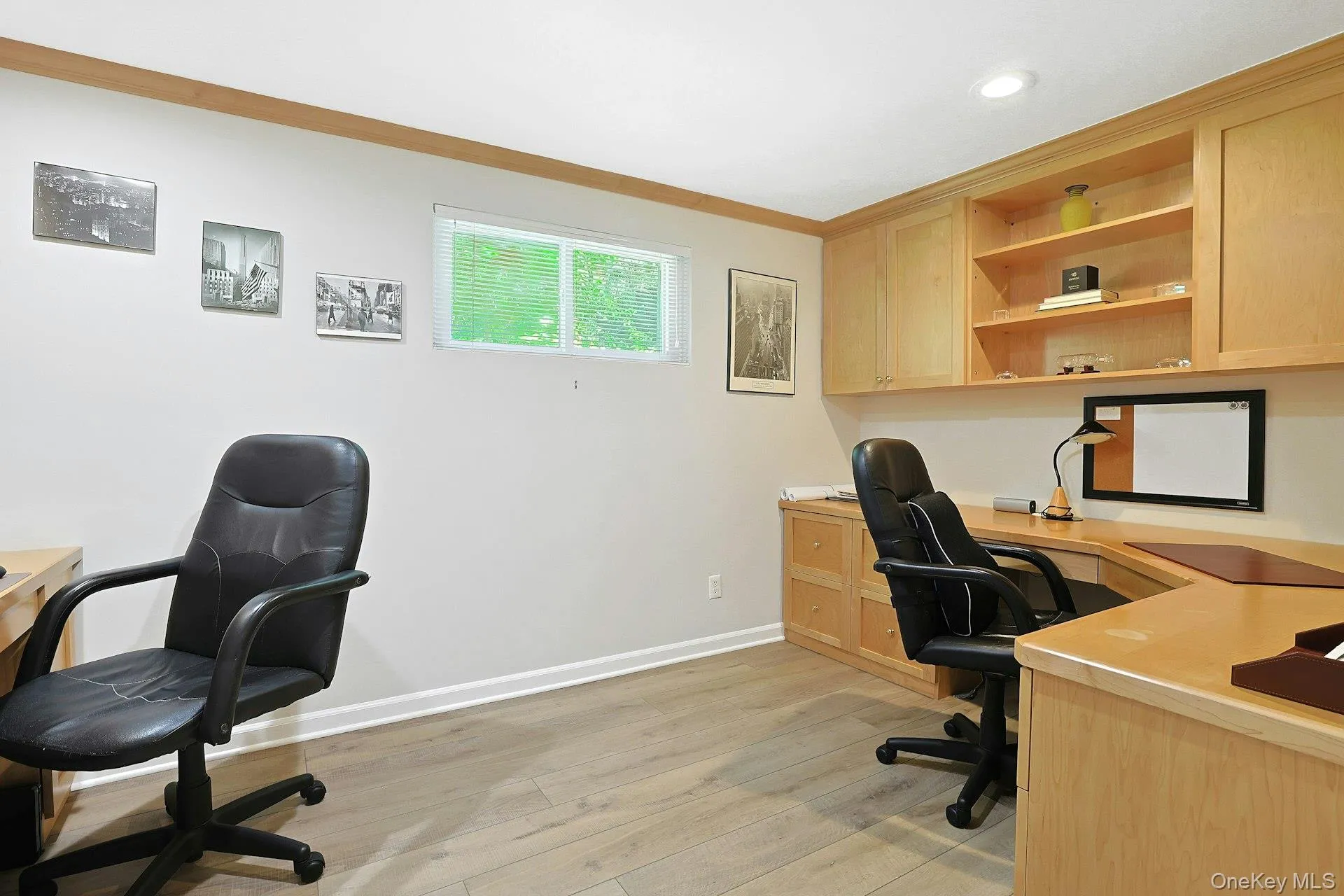 Fourth bedroom/ office in the lower level. Currently being used as an office. Fourth bedroom/ office in the lower level. Currently being used as an office.