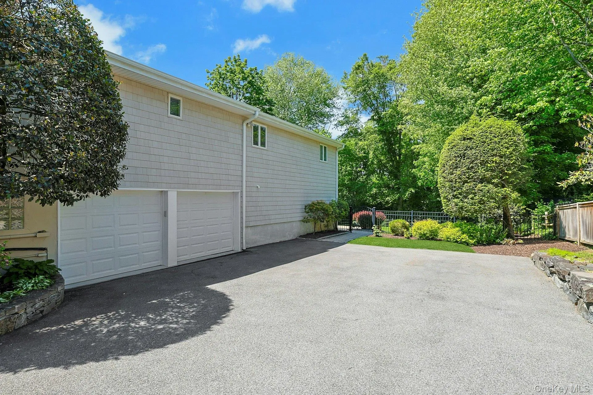Spacious two car garge and work shop area. New garage door motors just installed May 2026. Spacious two car garge and work shop area. New garage door motors just installed May 2026.