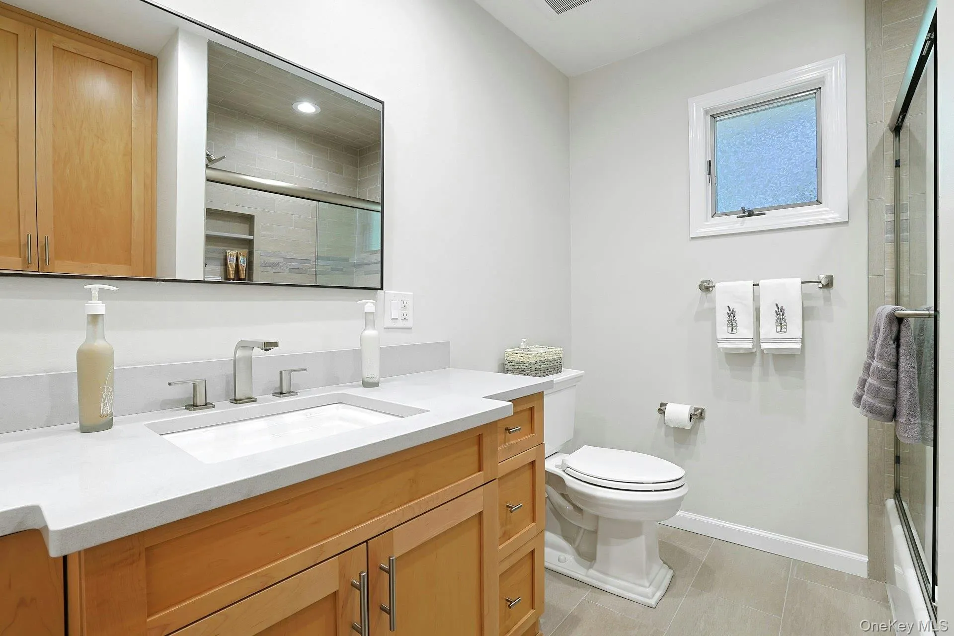 Updated hall bath. Updated hall bath.