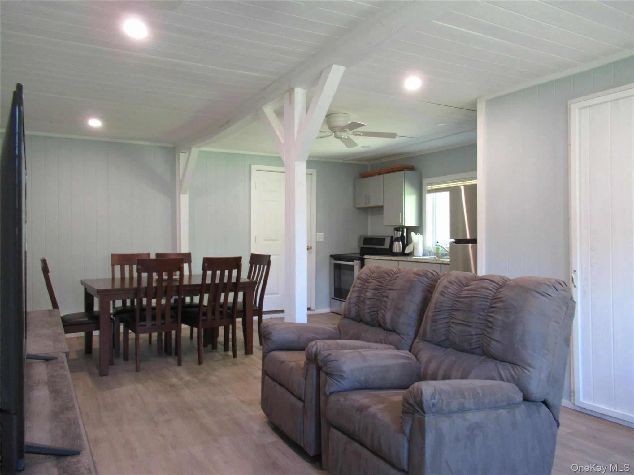 Open concept Living area with recessed lighting and ceiling fan Open concept Living area with recessed lighting and ceiling fan