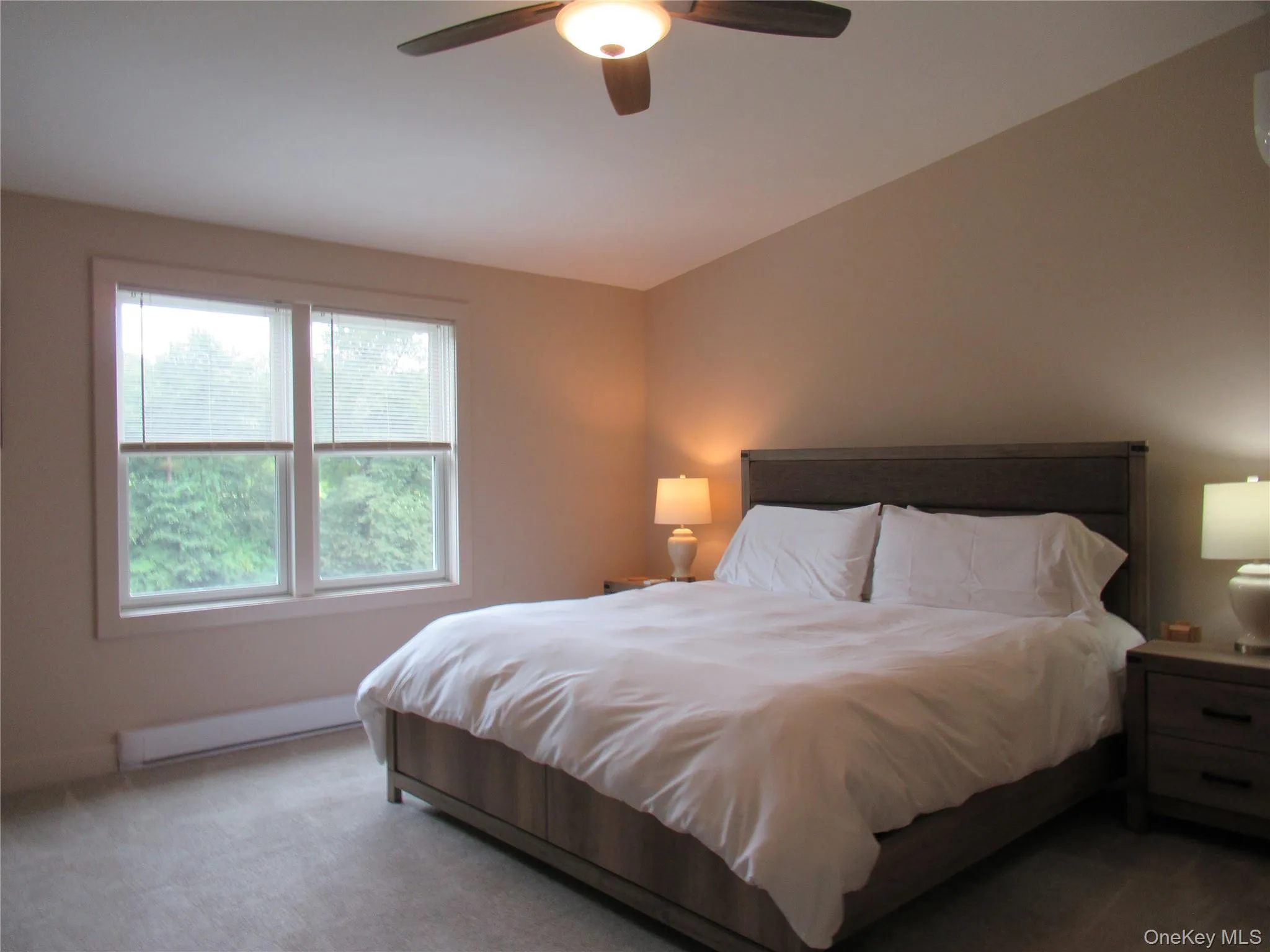 Main Bedroom with ceiling fan and river views Main Bedroom with ceiling fan and river views