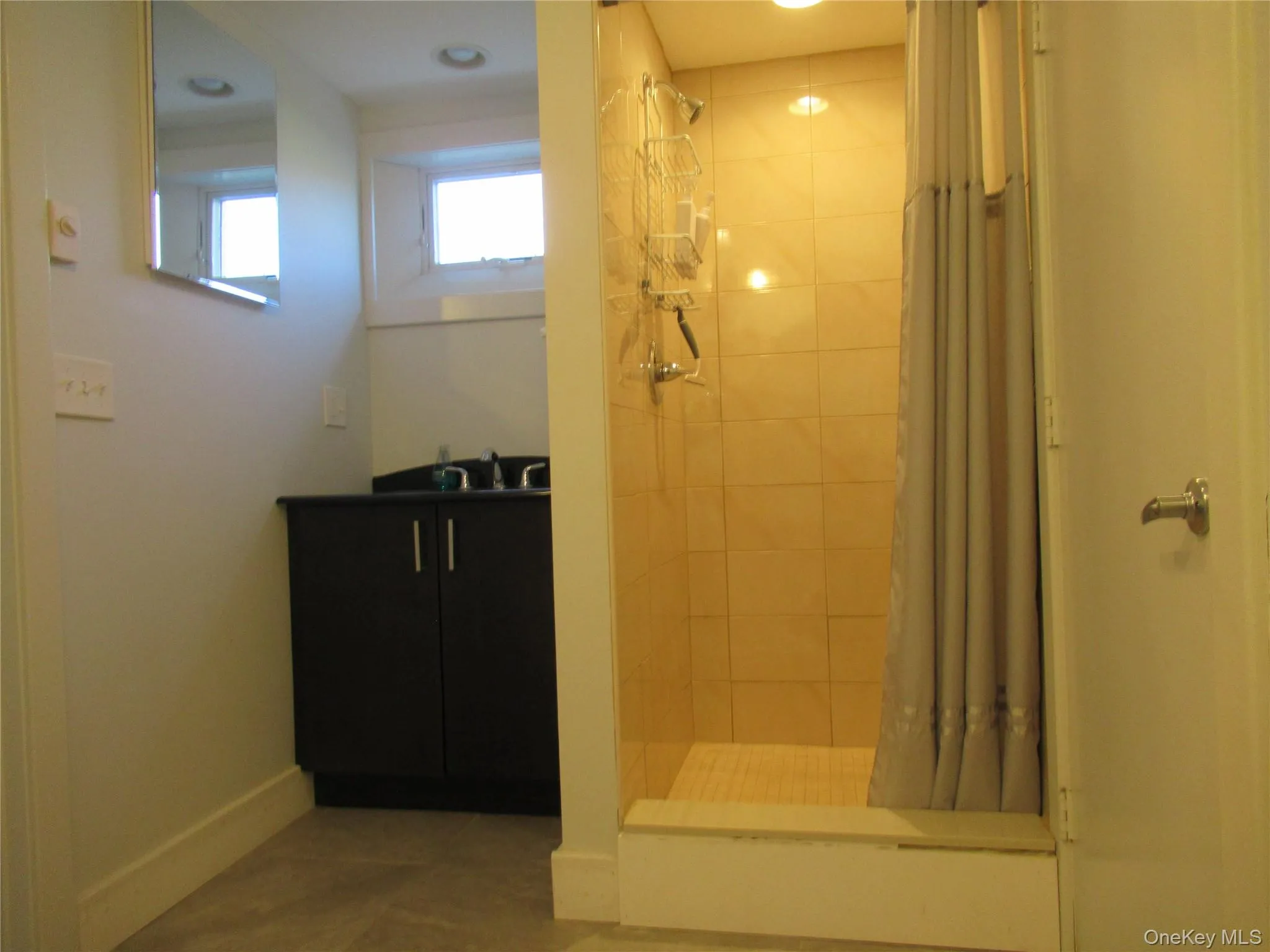 Another full bath with a shower Another full bath with a shower
