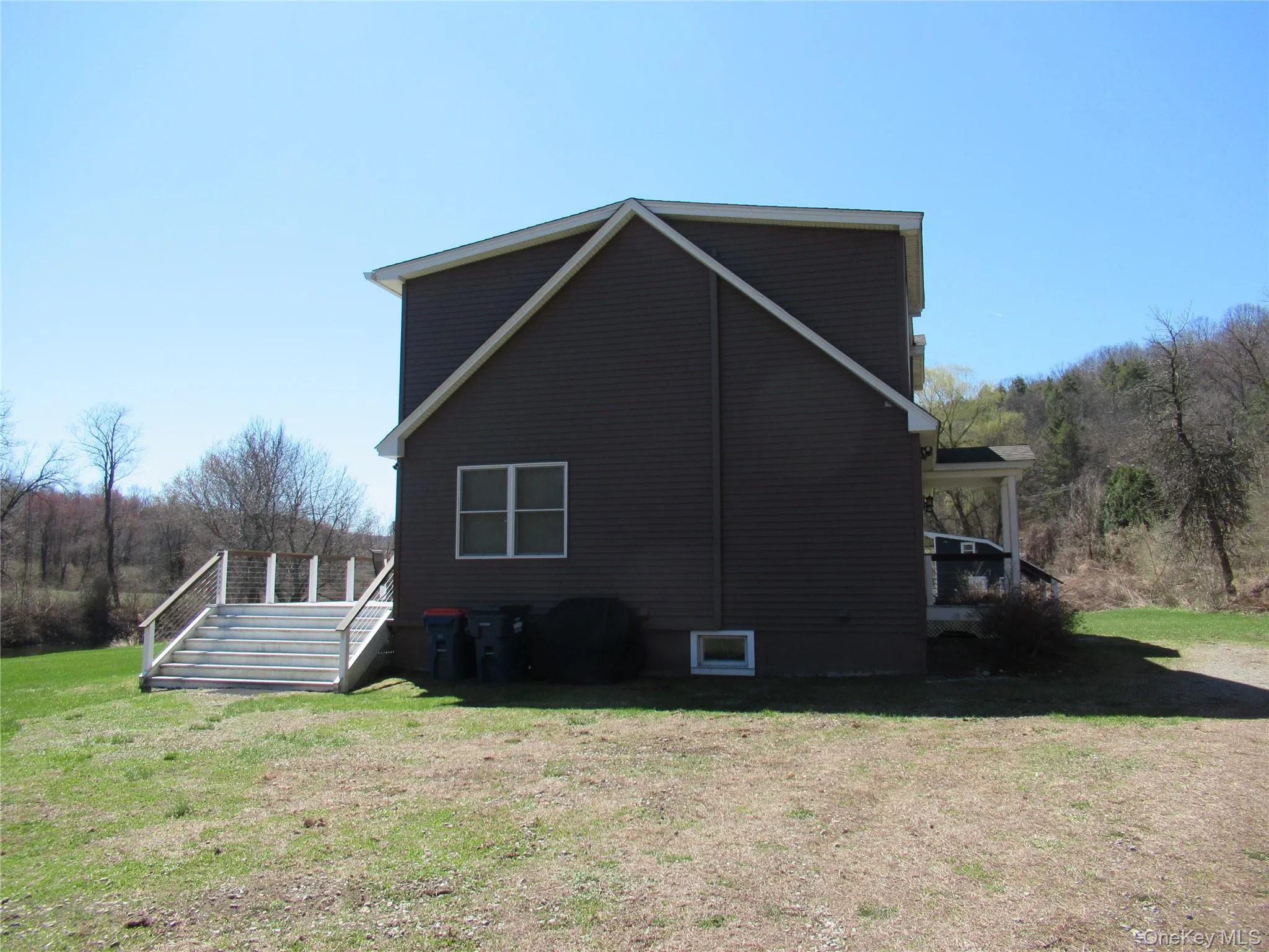 Left side with stairs to deck Left side with stairs to deck