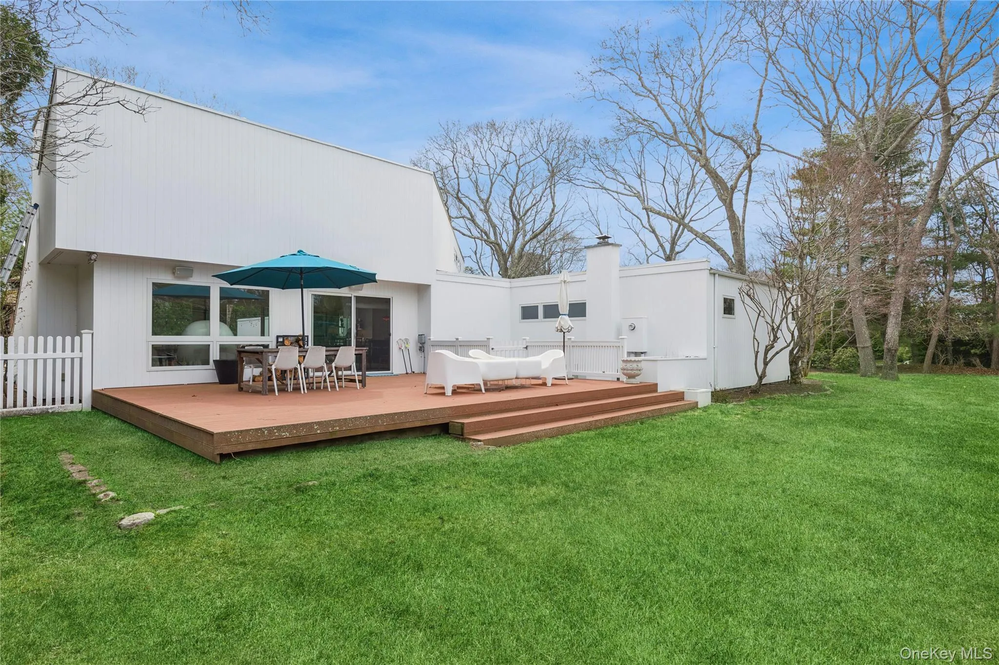 Outdoor deck are by tennis court Outdoor deck are by tennis court