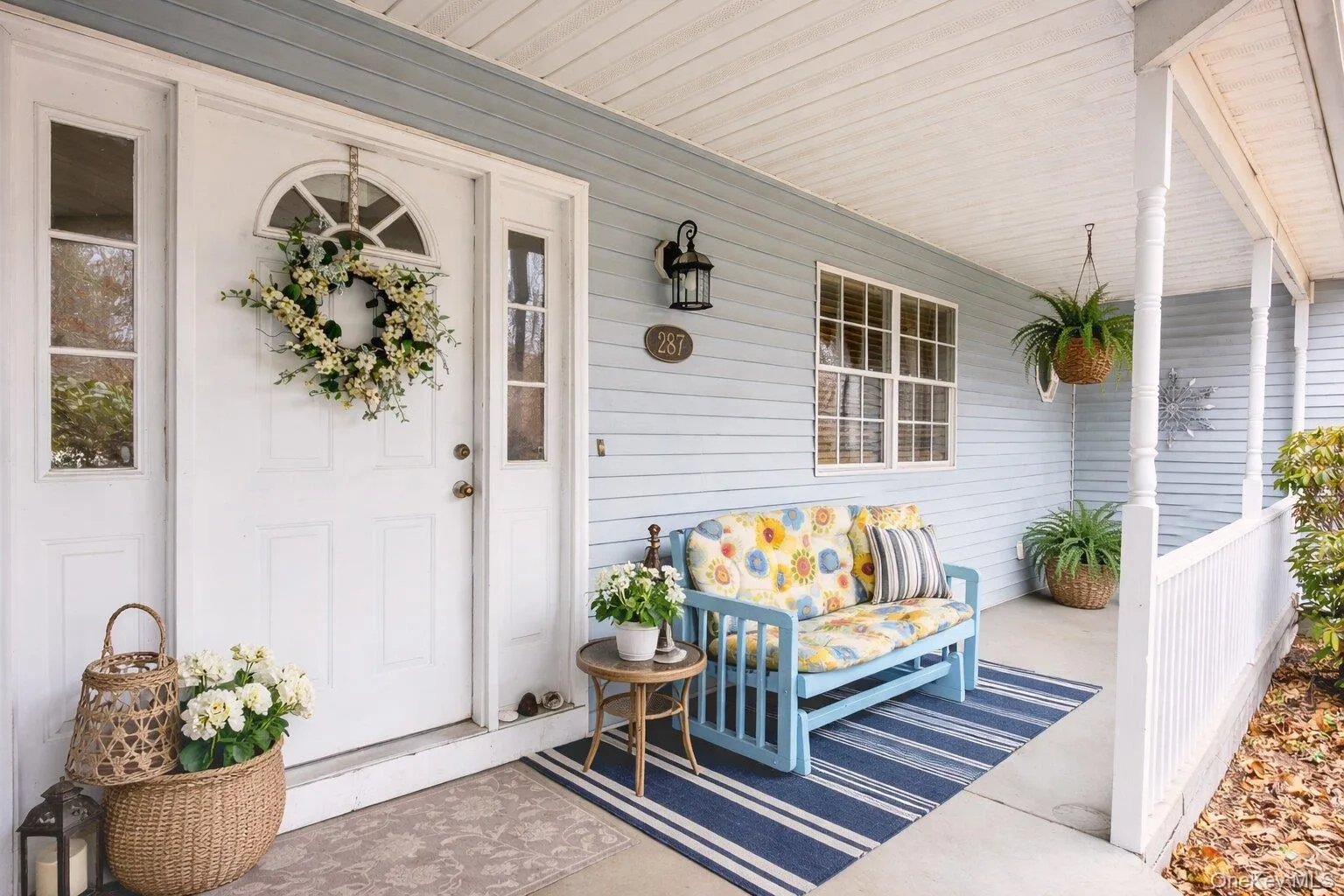 Large wrap around front porch - Photo has been staged Large wrap around front porch - Photo has been staged