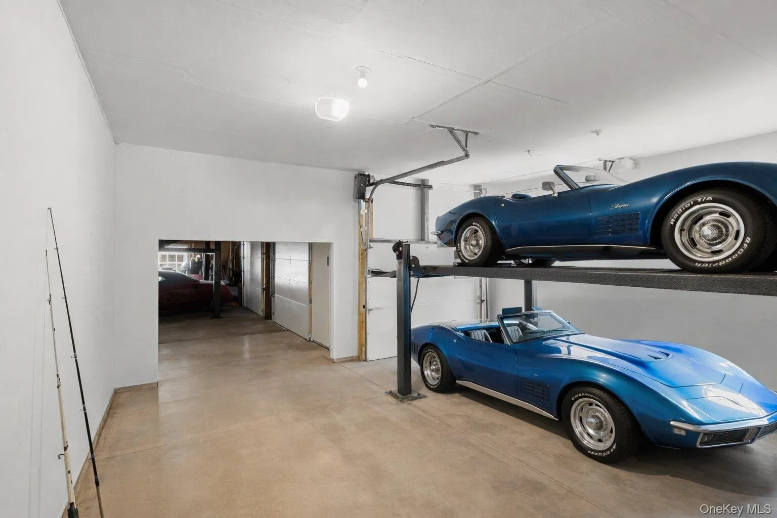 Original garage located off of laundry room - Photo has been staged (Lift not included) Original garage located off of laundry room - Photo has been staged (Lift not included)