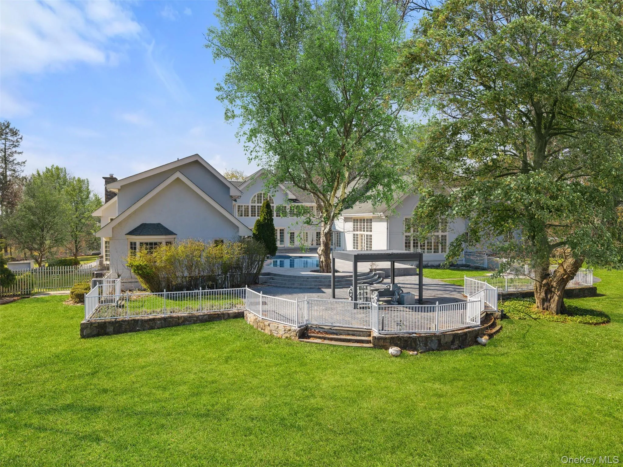 View of property showing a patio, a swimming pool, and a fenced backyard View of property showing a patio, a swimming pool, and a fenced backyard