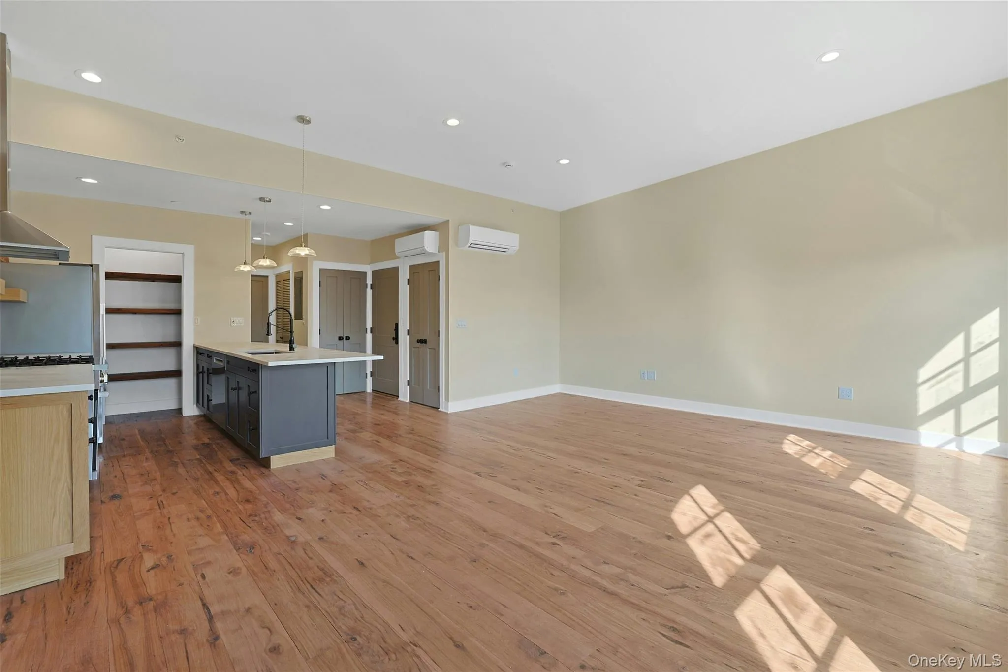 Dining, living and kitchen areas. Dining, living and kitchen areas.