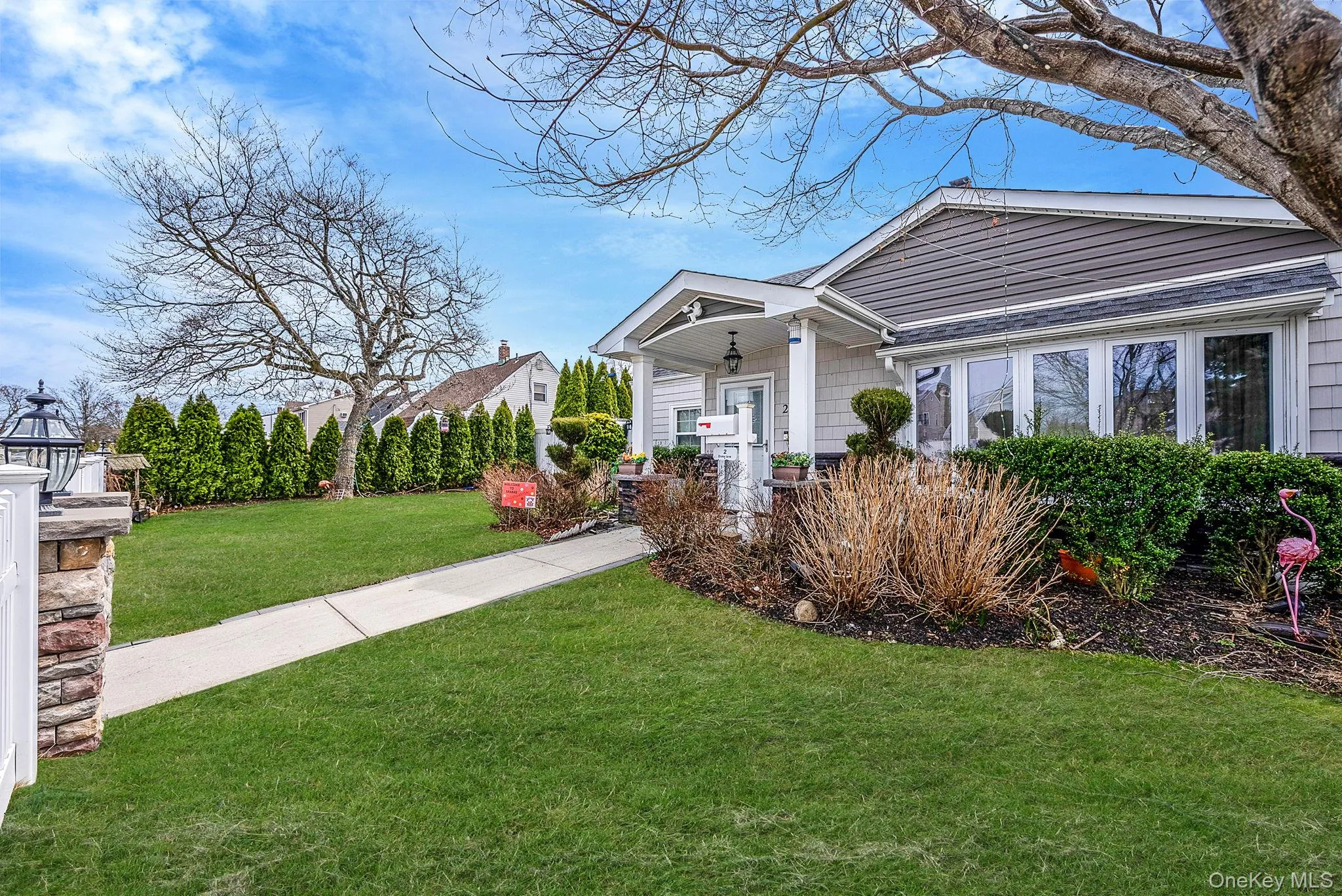 View of front facade featuring a front yard View of front facade featuring a front yard