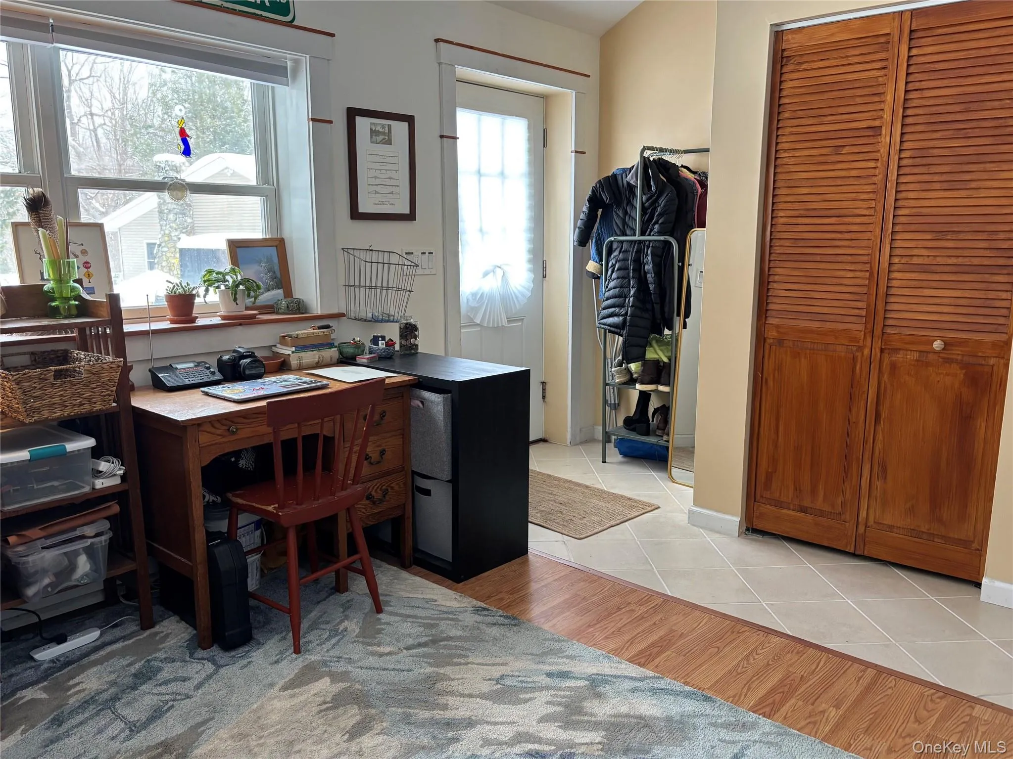 Office area featuring light tile patterned floors Office area featuring light tile patterned floors