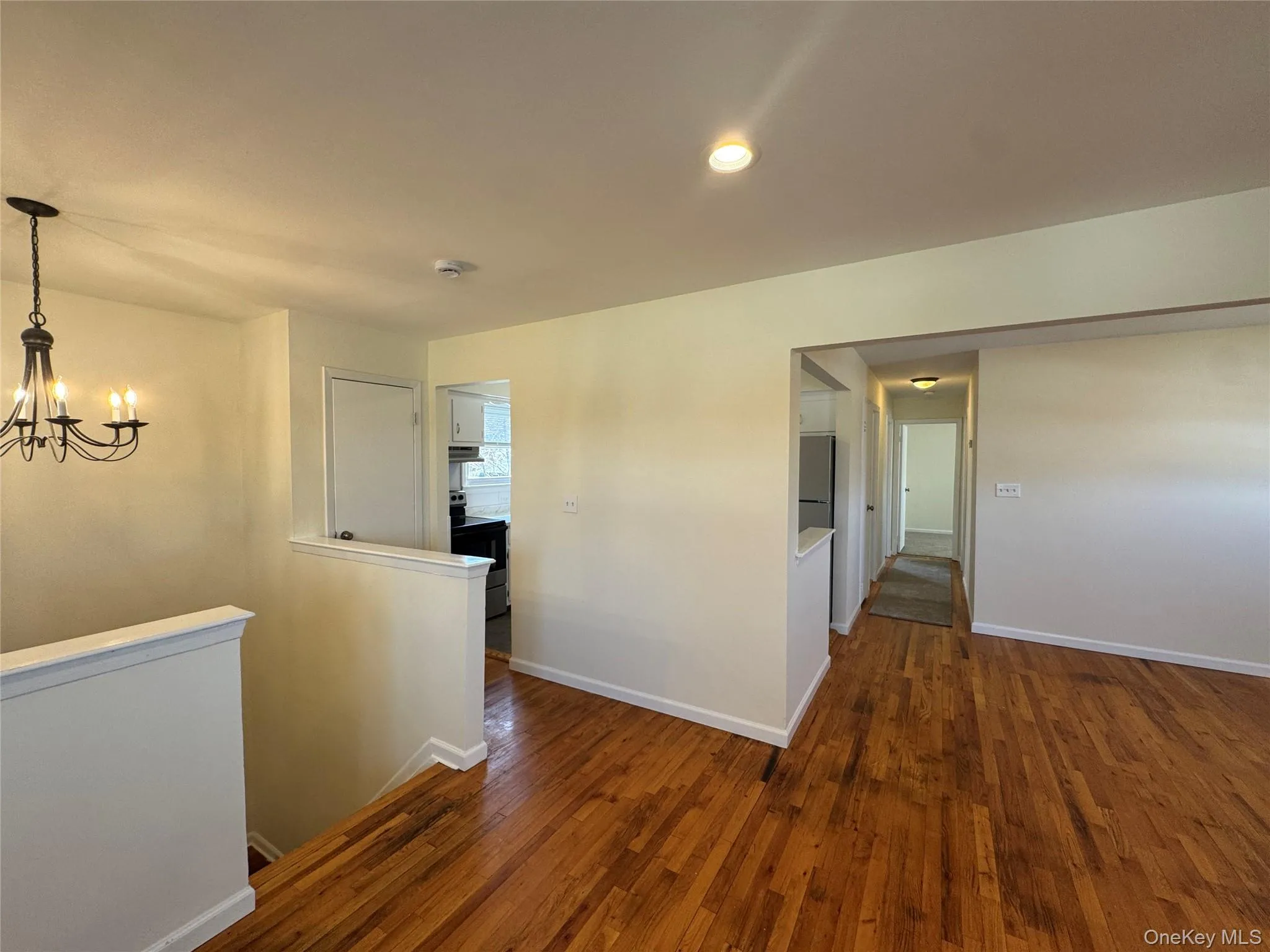 Second floor living space - wood floors in common spaces, recessed lighting Second floor living space - wood floors in common spaces, recessed lighting