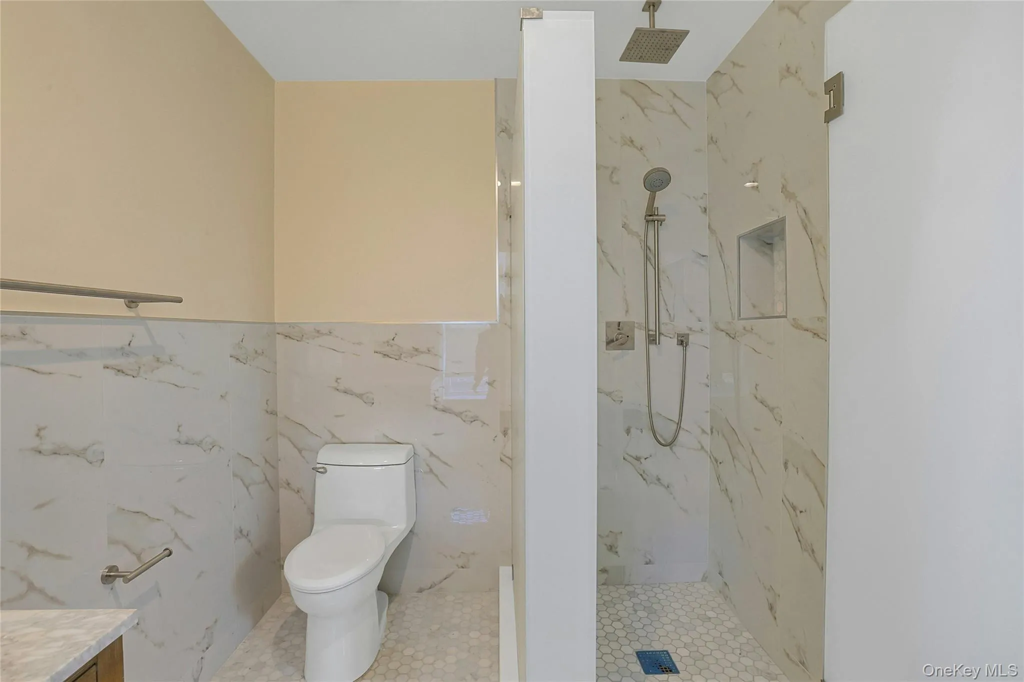 Sun-filled European-style en-suite bathroom. Sun-filled European-style en-suite bathroom.
