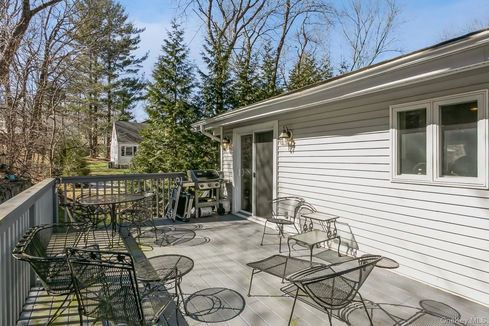 Deck featuring outdoor dining area and grilling area Deck featuring outdoor dining area and grilling area