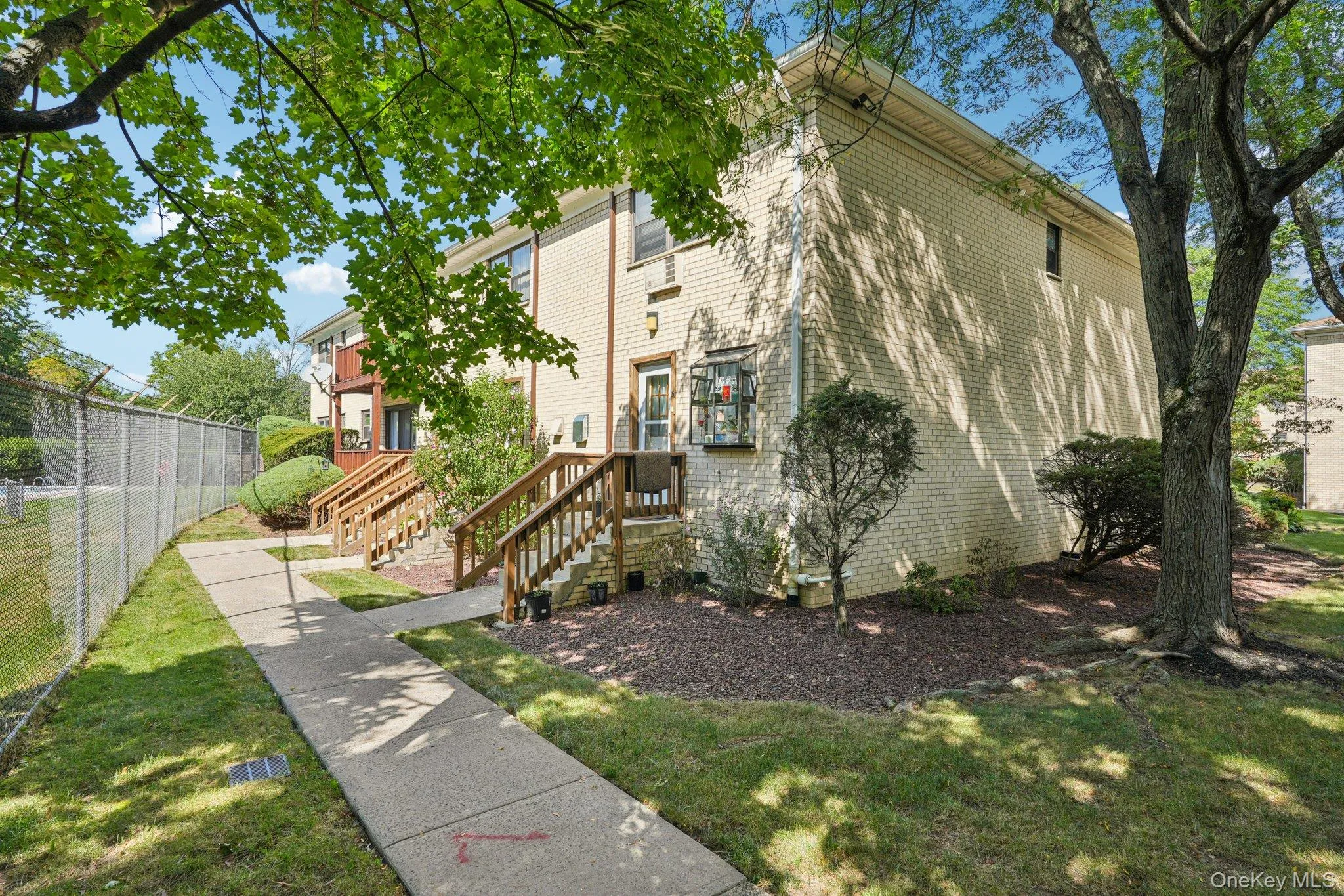 View of side of property featuring brick siding View of side of property featuring brick siding