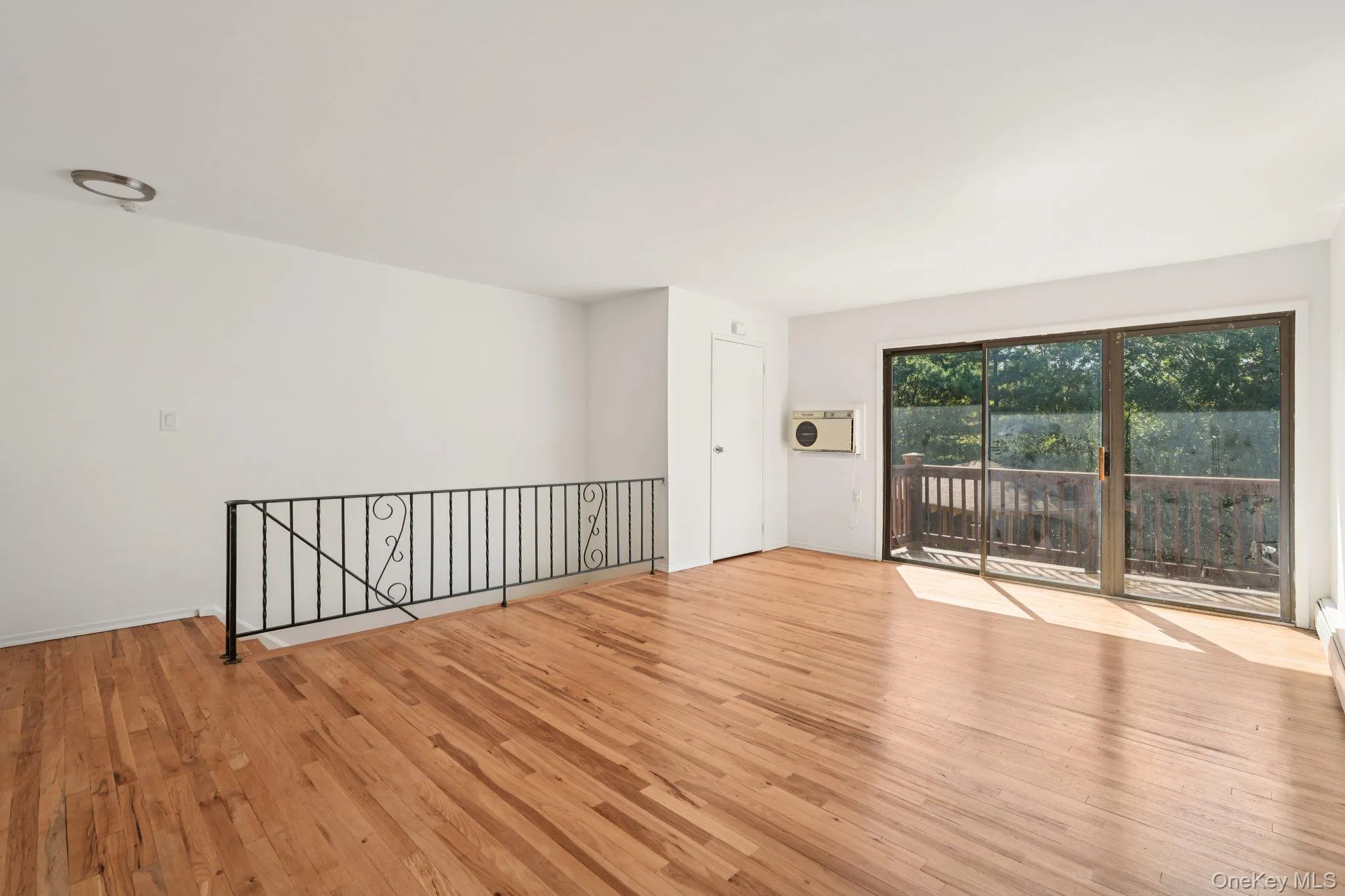 Unfurnished room featuring light wood-type flooring Unfurnished room featuring light wood-type flooring