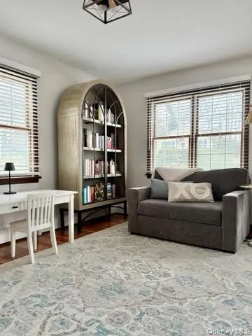 Living area featuring wood finished floors Living area featuring wood finished floors