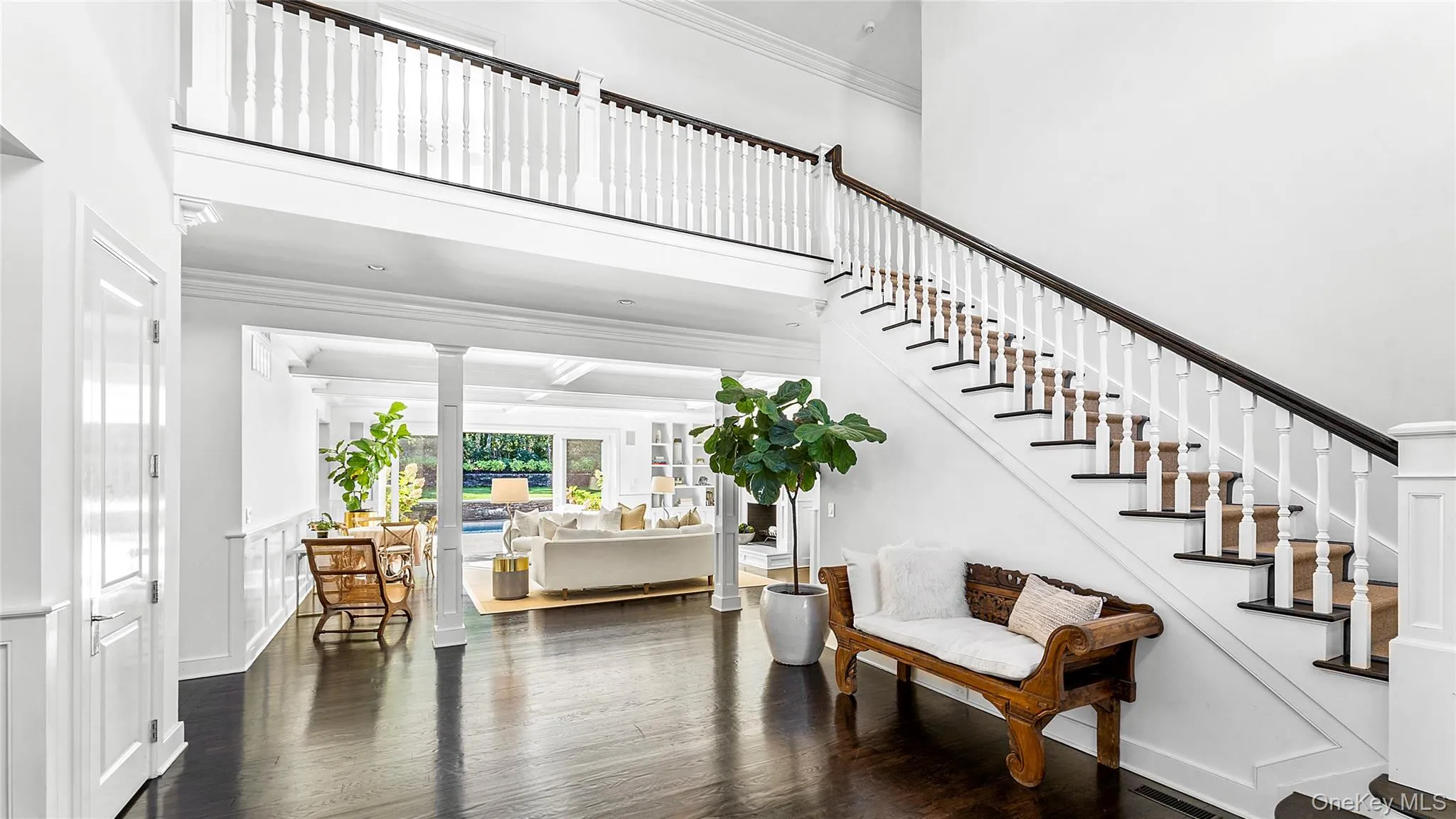 Dramatic double height entry foyer Dramatic double height entry foyer