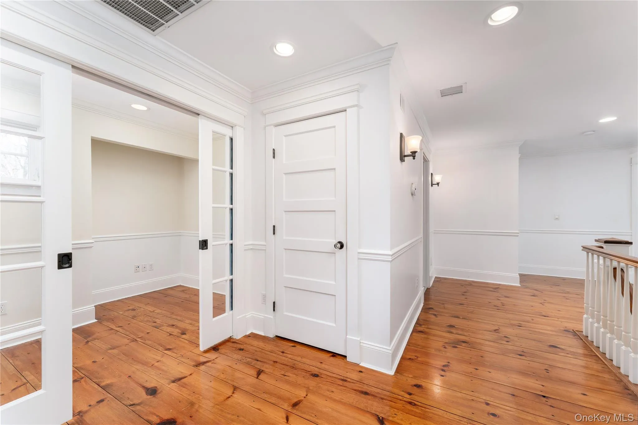 Second Floor Hallway/Landing With Pocket Doors To Home Office. Second Floor Hallway/Landing With Pocket Doors To Home Office.