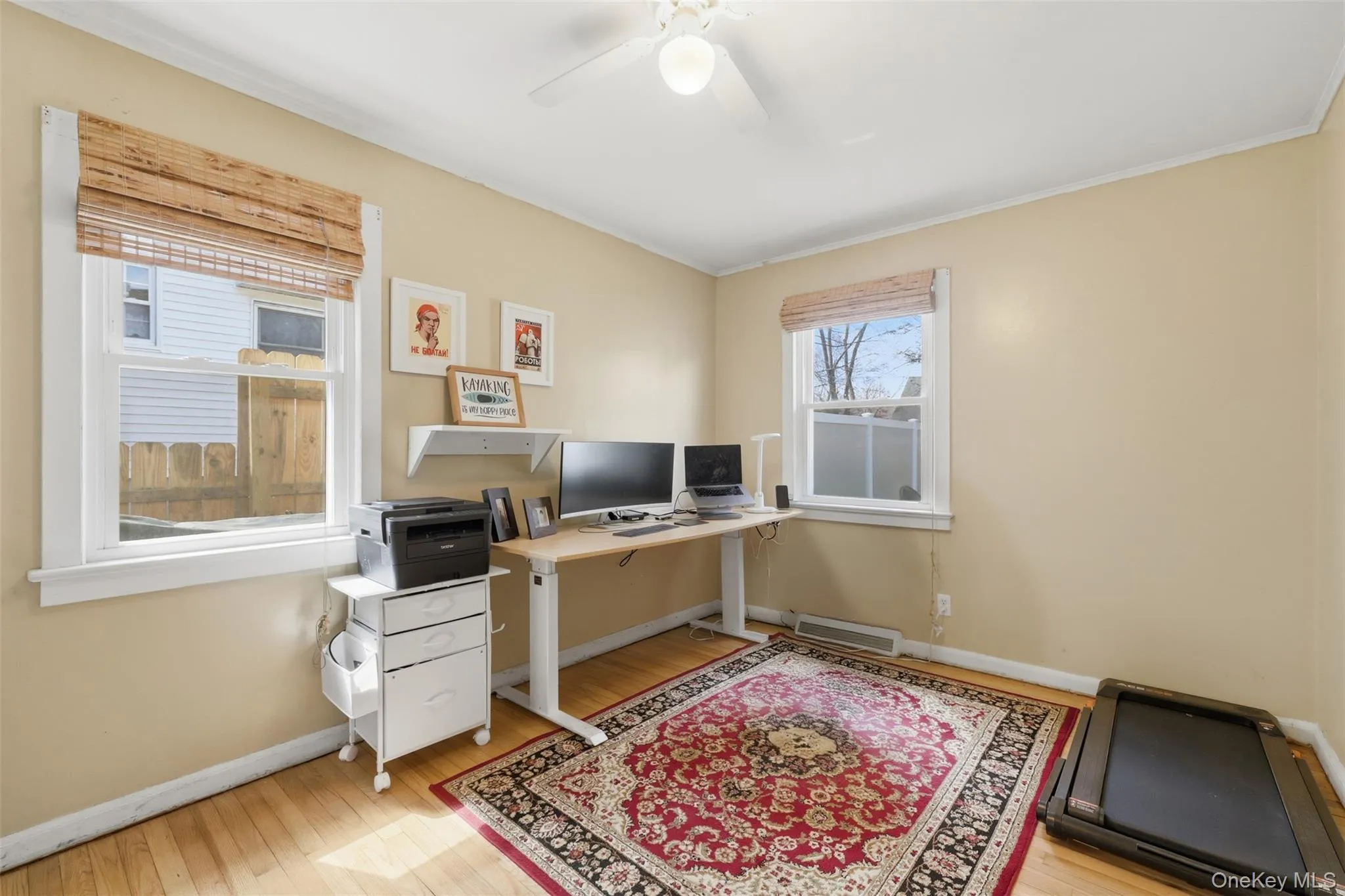 Bedroom currently setup as an office with hardwood floors, and lots of natural light Bedroom currently setup as an office with hardwood floors, and lots of natural light