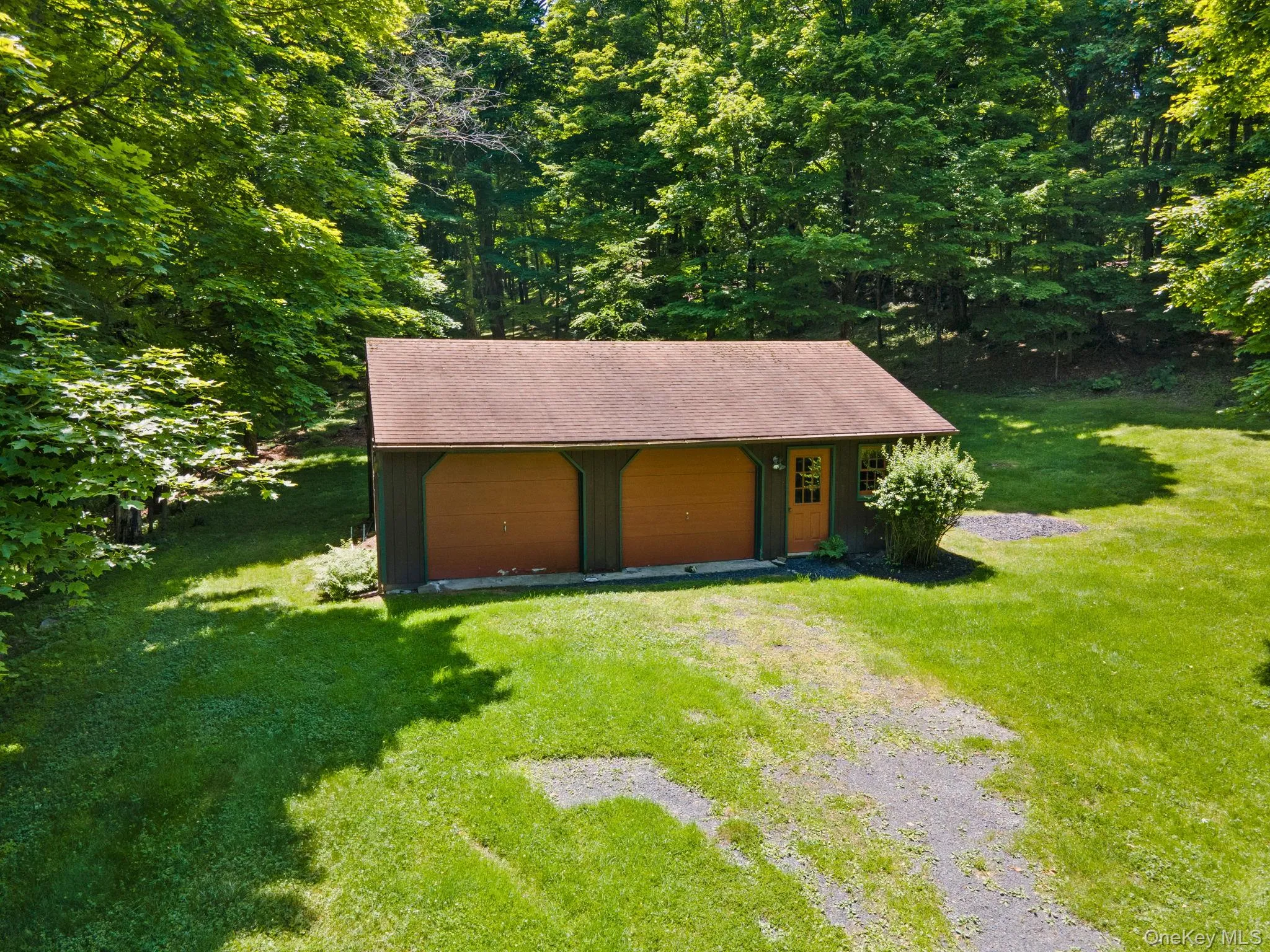 View of outbuilding with driveway View of outbuilding with driveway