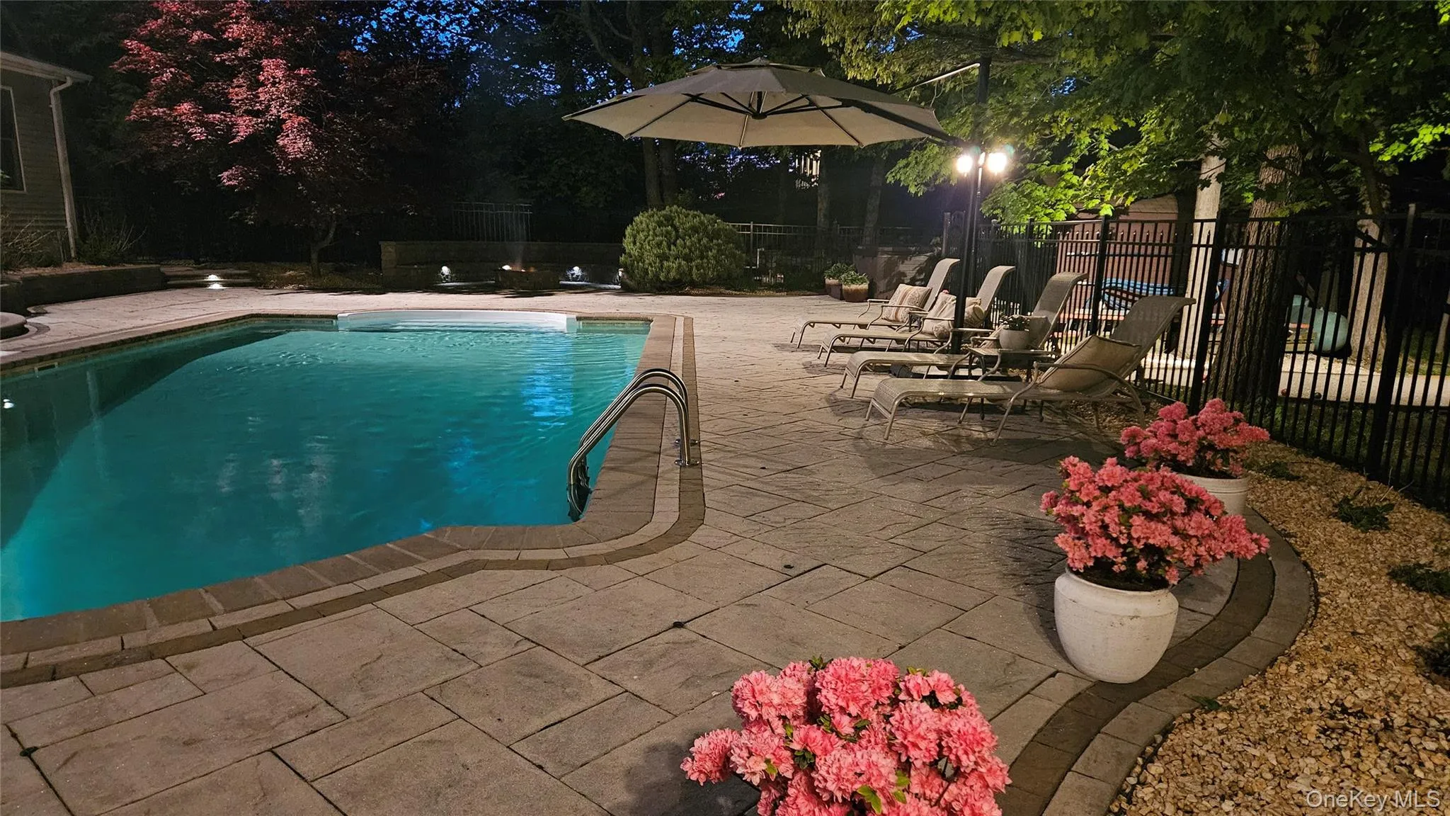 With landscape lighting. With landscape lighting.