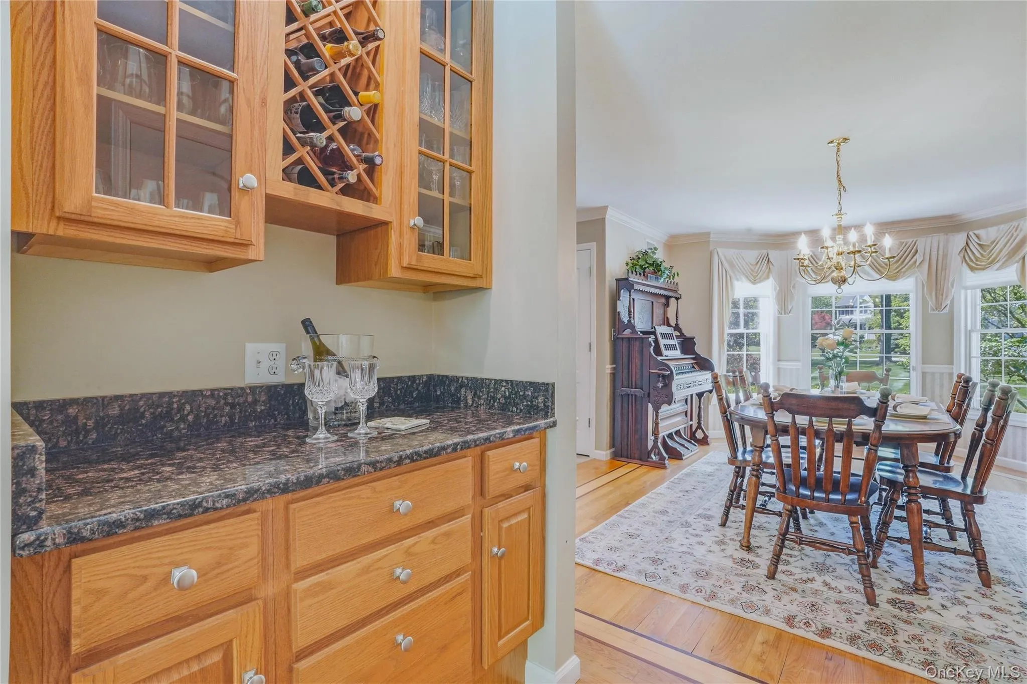 Wine or coffee bar with ample cabinets. Wine or coffee bar with ample cabinets.