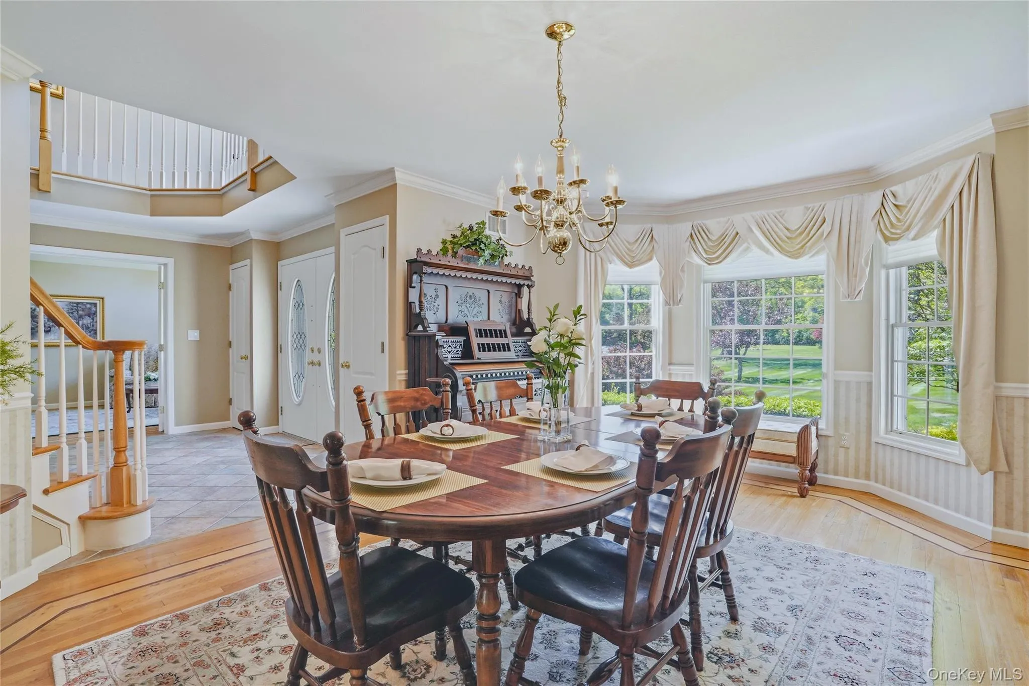 Formal dining room with large entryway to foyer. Formal dining room with large entryway to foyer.