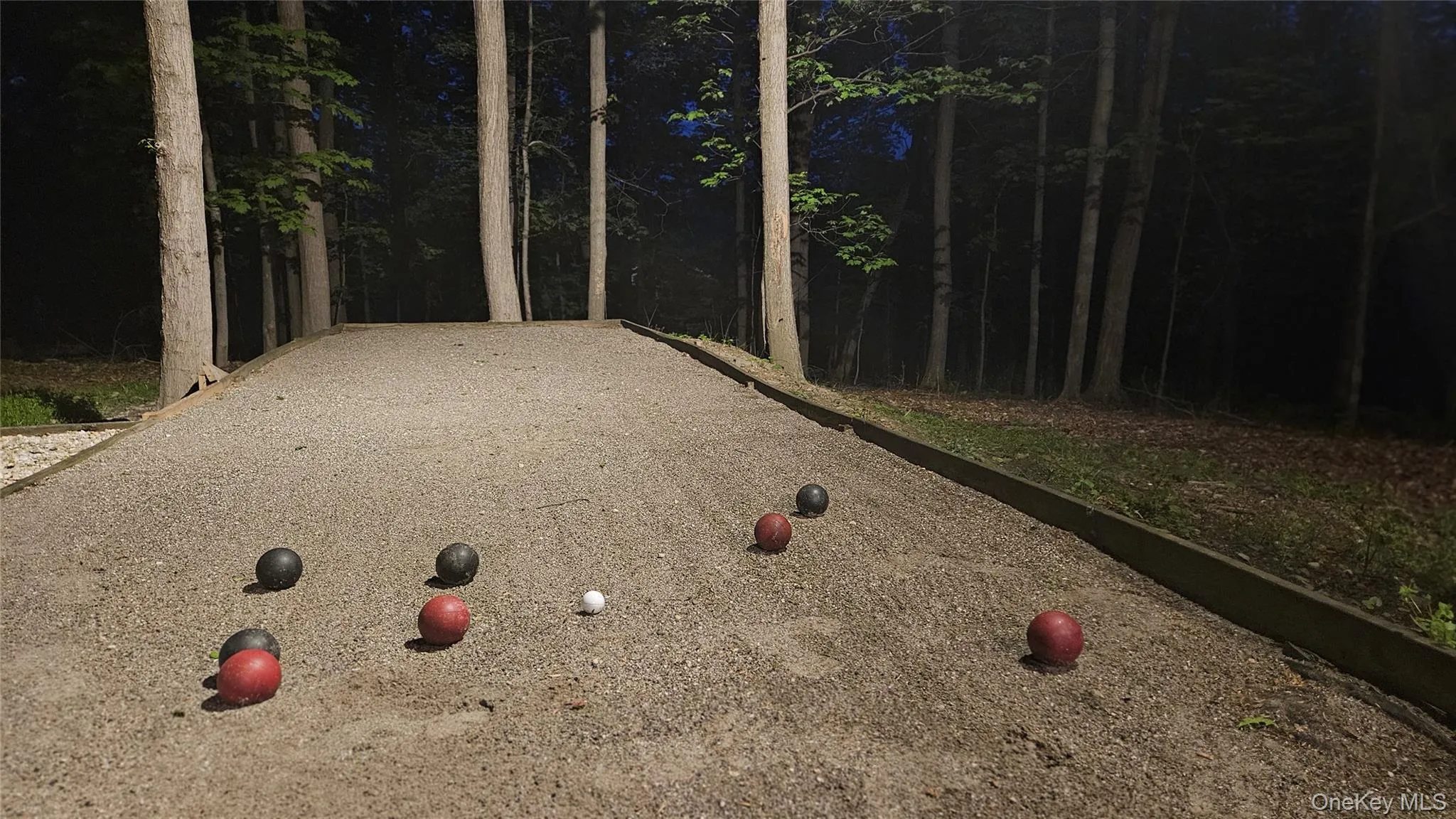 Bocce ball court, Cornhole or Horseshoes! With landscape lighting. Bocce ball court, Cornhole or Horseshoes! With landscape lighting.