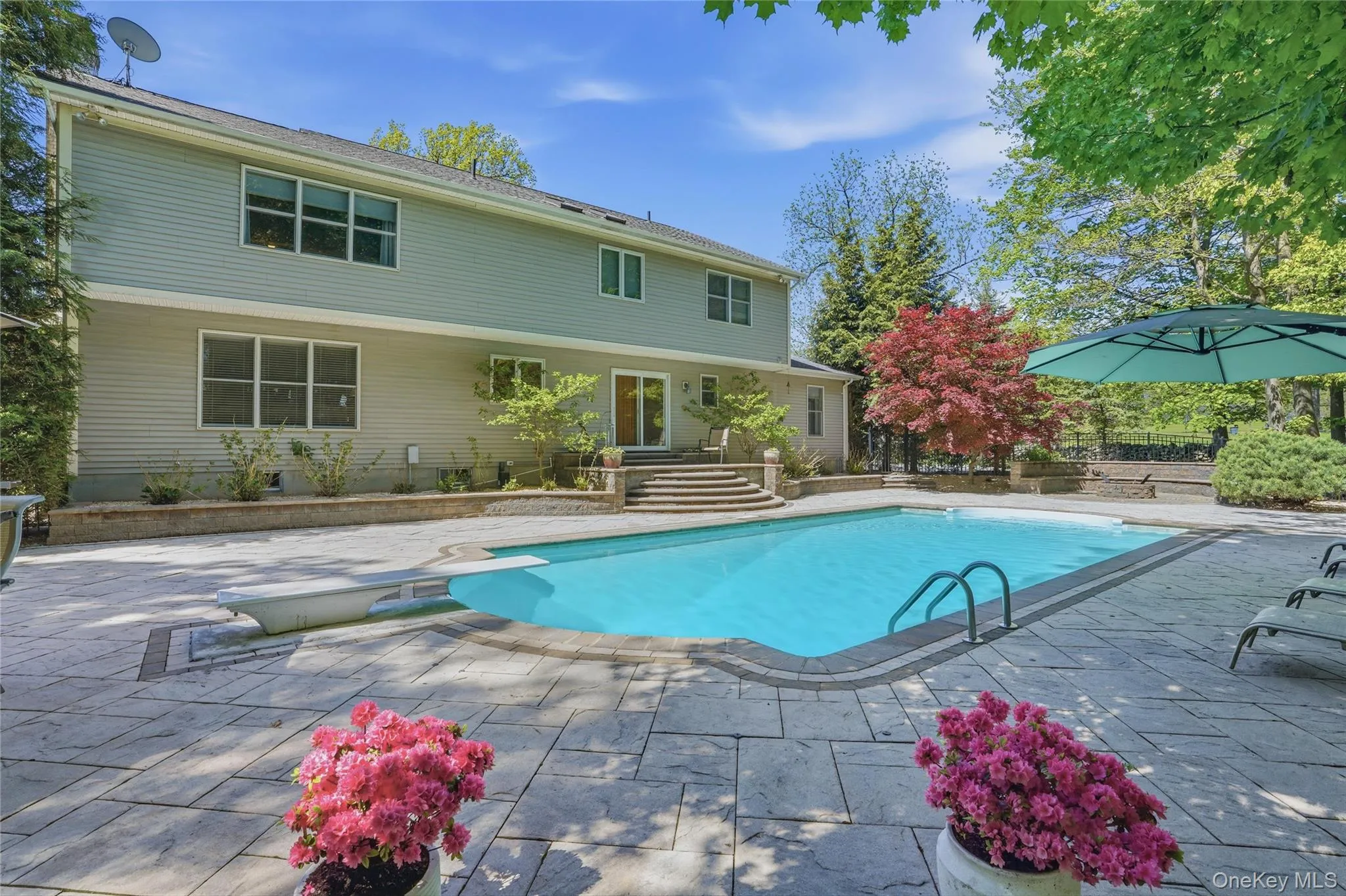 Custom designed paver stones around pool area, by local artisan. Custom designed paver stones around pool area, by local artisan.