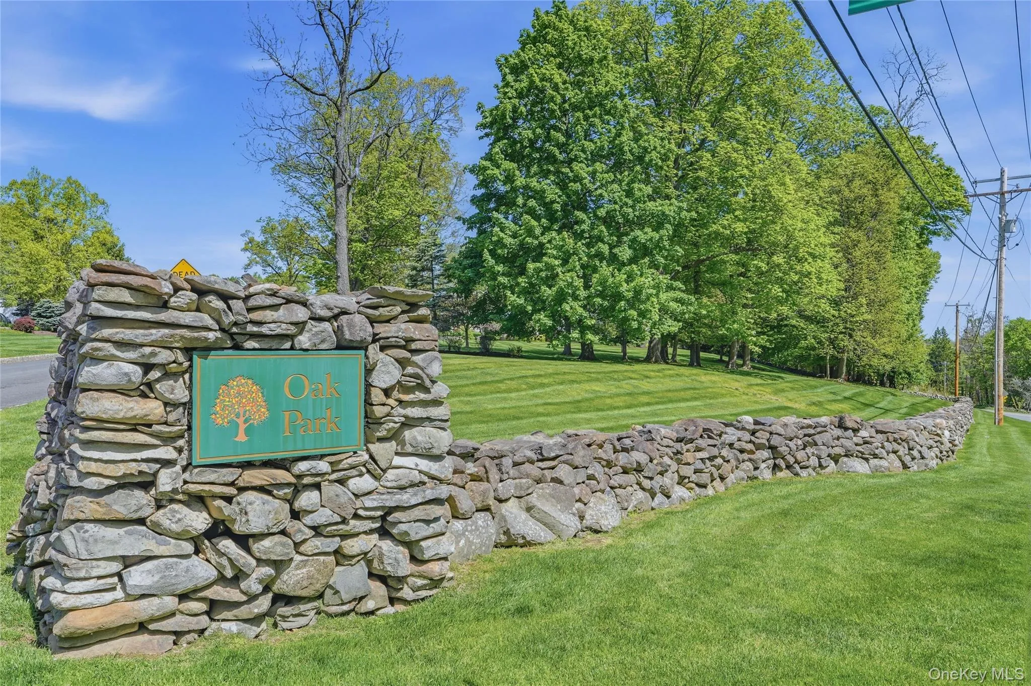 Located on a beautiful Cul-de-Sac with stone wall bordering the property. Located on a beautiful Cul-de-Sac with stone wall bordering the property.