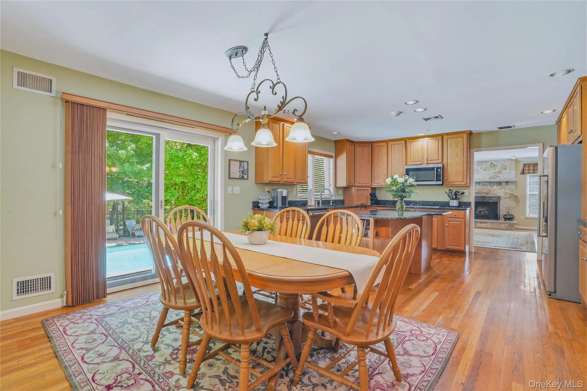 Eat in kitchen with indoor-outdoor flow to poolside entertaining. Eat in kitchen with indoor-outdoor flow to poolside entertaining.