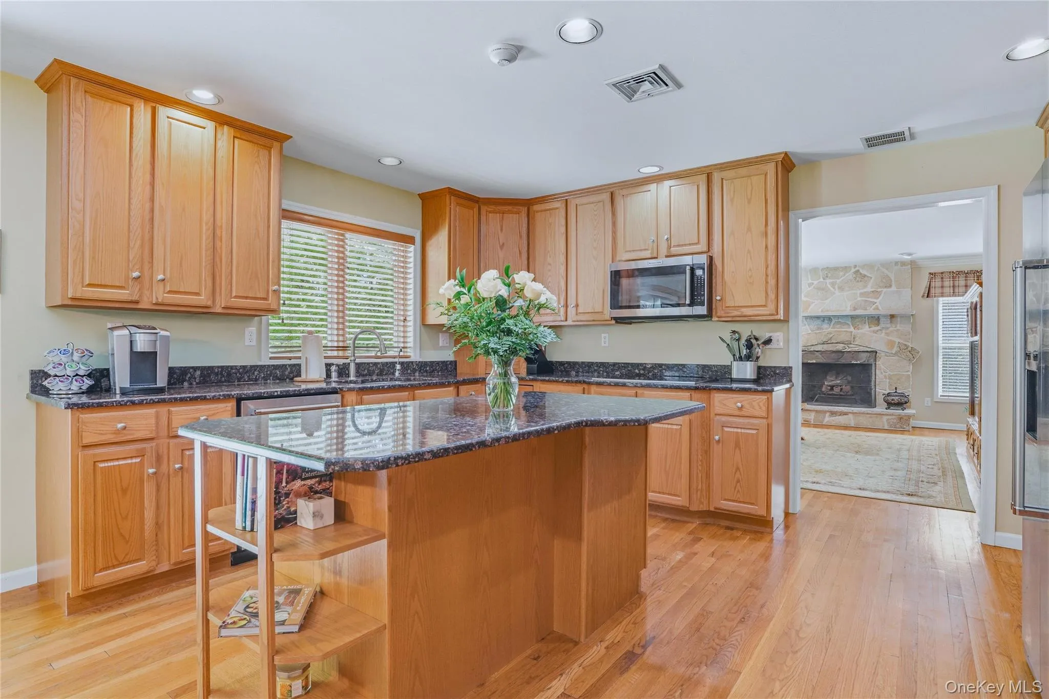 Large gourmet kitchen with granite island. Large gourmet kitchen with granite island.