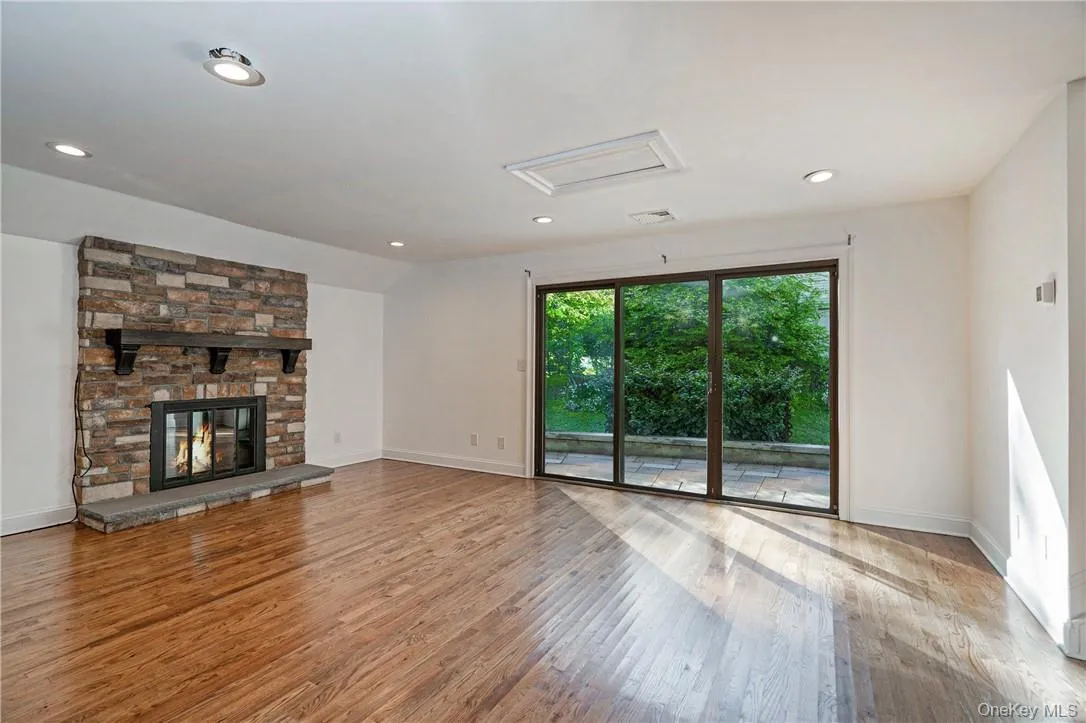 Living Room/ Fireplace/ Sliding Door to Patio Living Room/ Fireplace/ Sliding Door to Patio