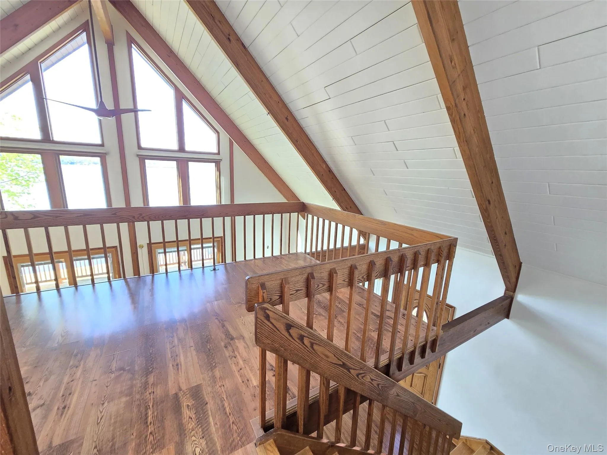 Loft area with water views and where laundry is located Loft area with water views and where laundry is located